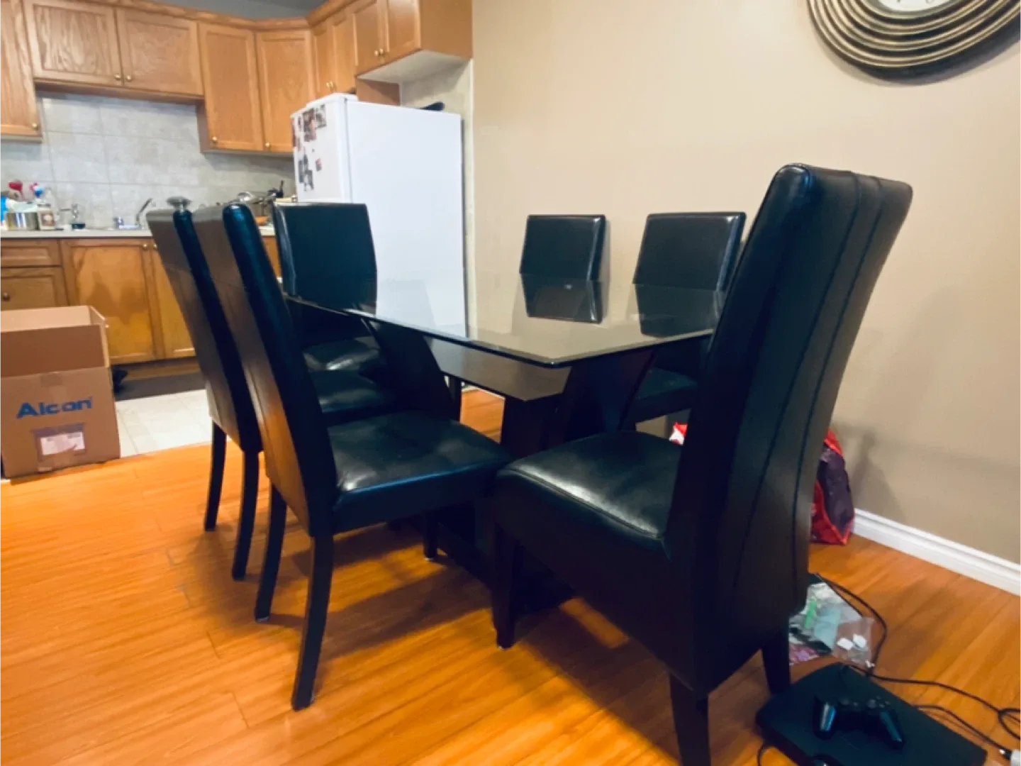 Glass Dining Table with 6 Black Leather Chairs image indicator(3)