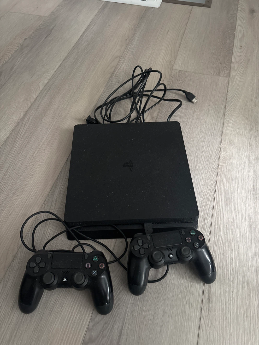 PlayStation 4 Slim with 2 Controllers