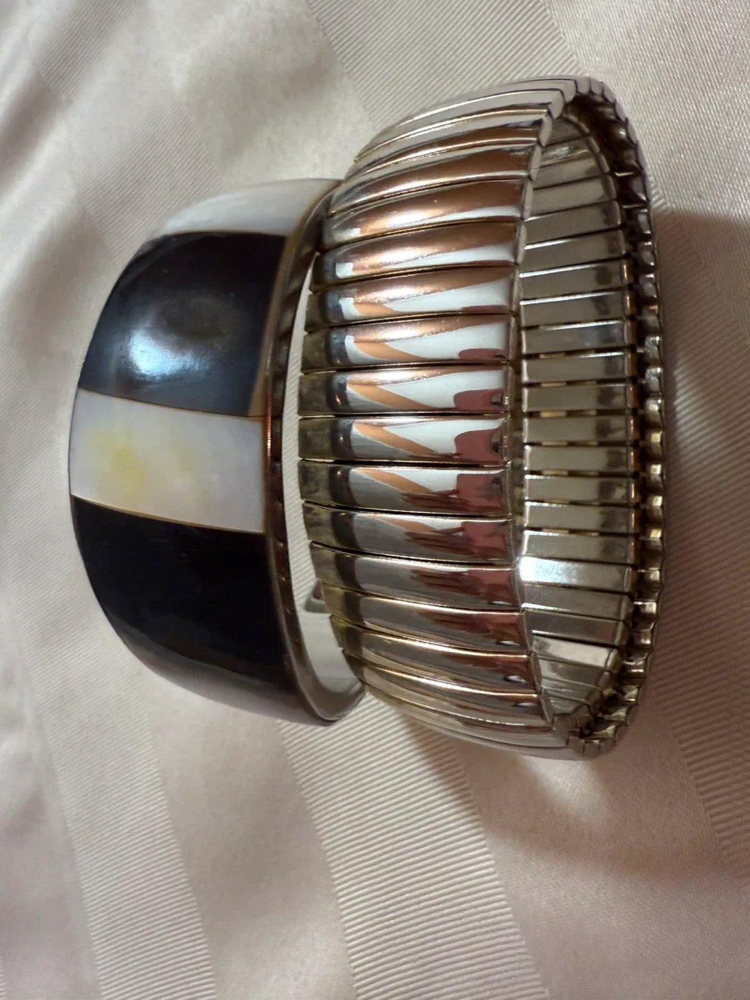 Two Bracelets: Black & White Cuff, Silver Stretch image indicator(2)