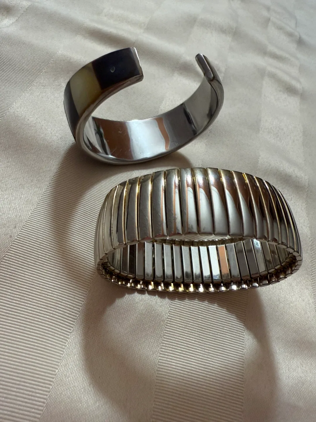 Two Bracelets: Black & White Cuff, Silver Stretch image indicator(4)