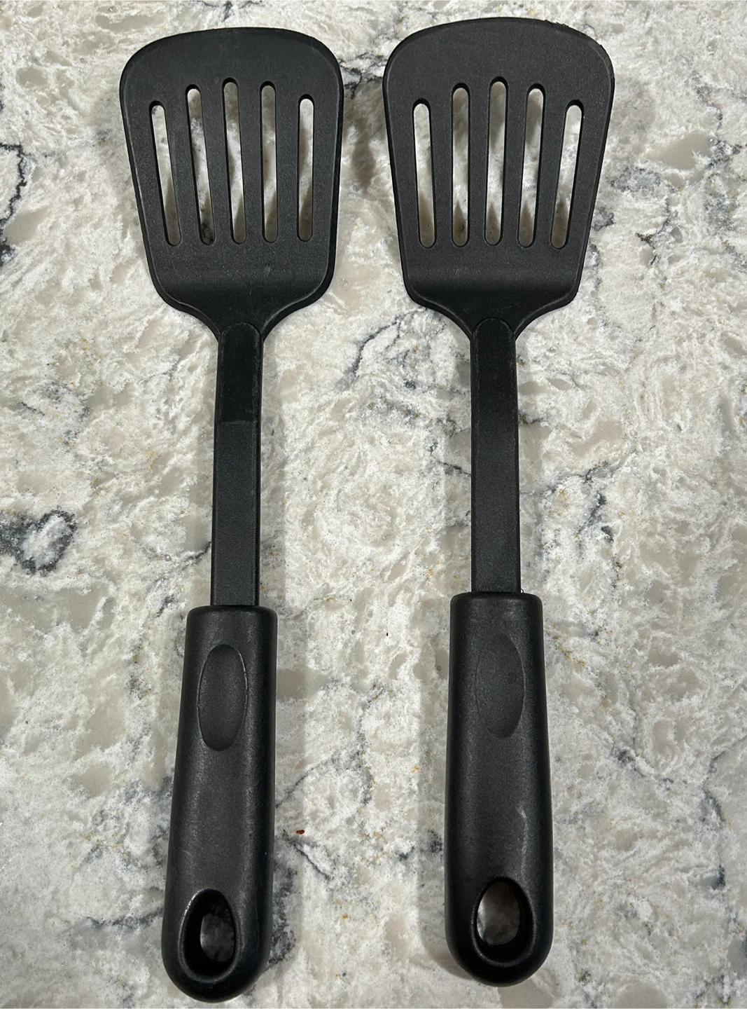 Two Black Slotted Spatulas
