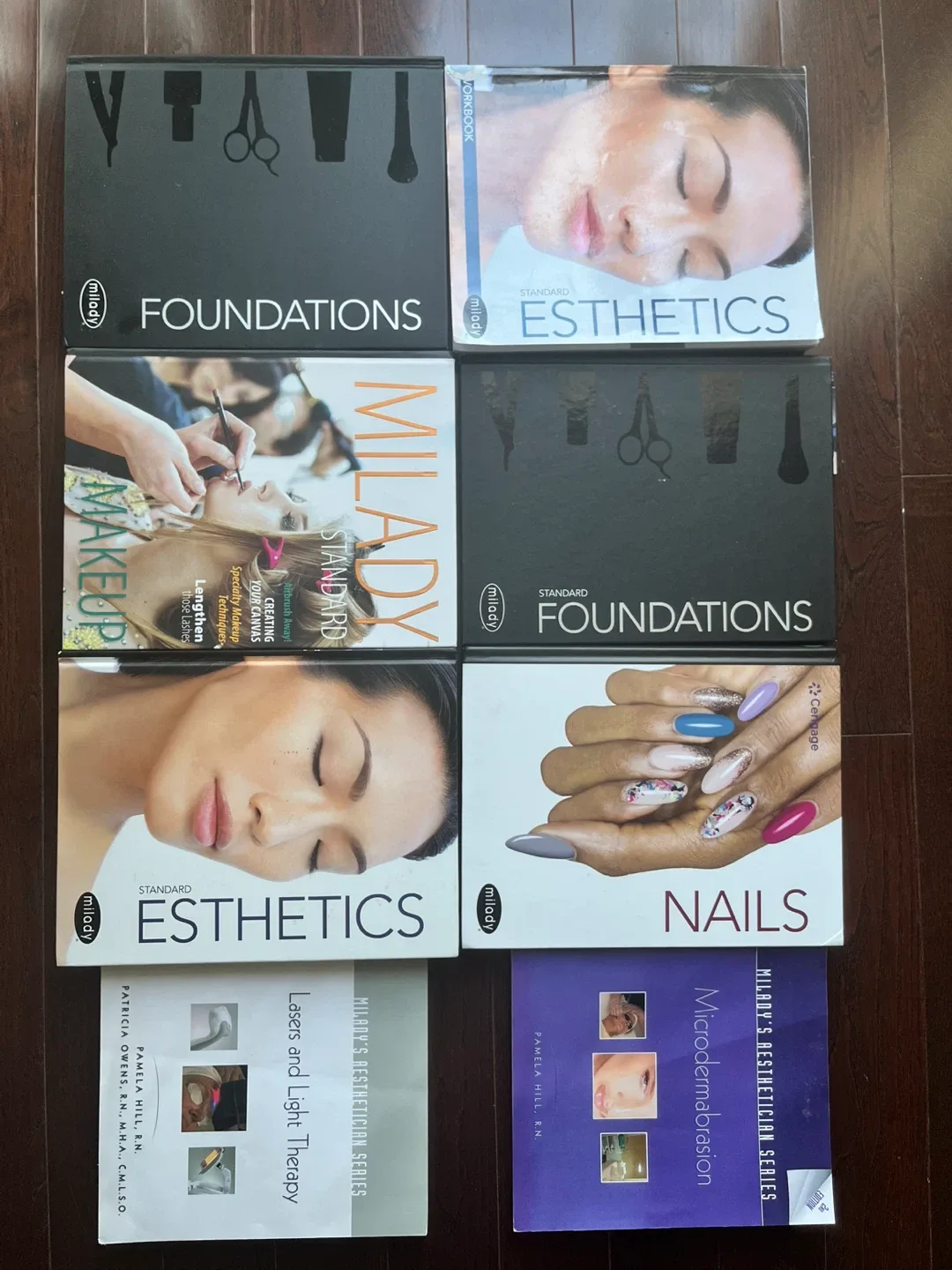 Milady Esthetics & Nail Books + Rolling Case image indicator(4)