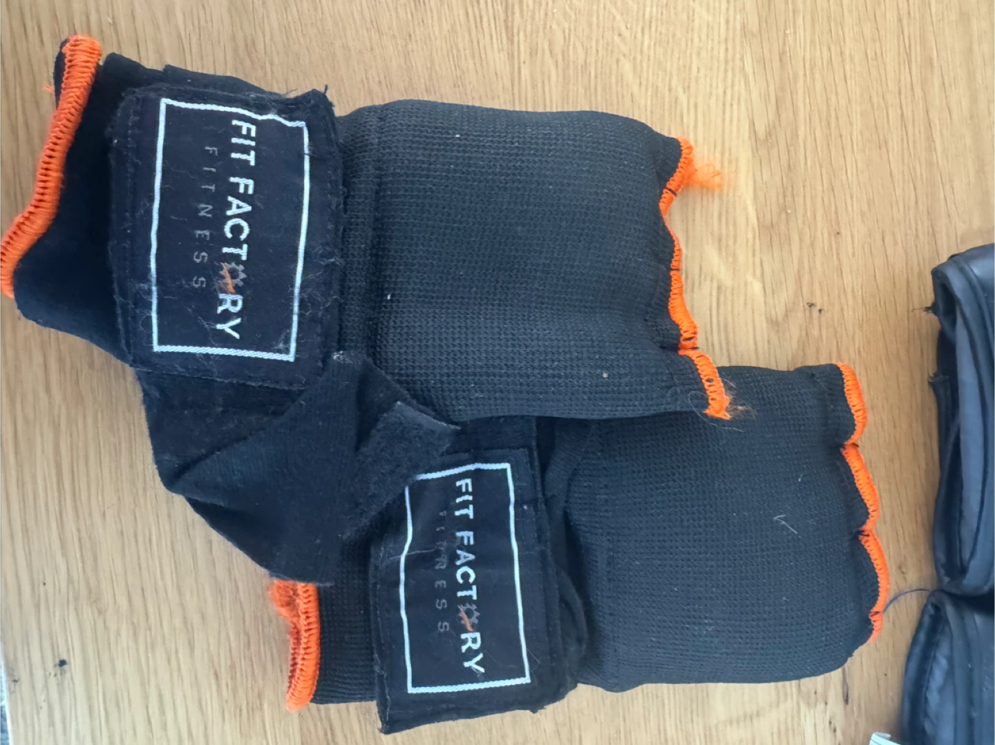 Black and Orange boxing hand wraps