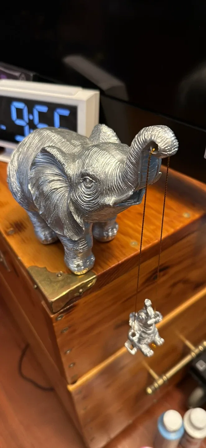 Silver Elephant Statue with Swinging Baby thumbnail