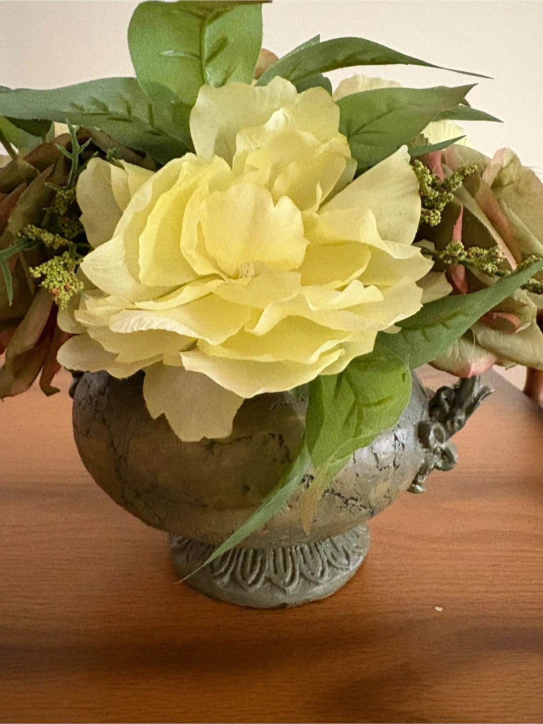 Floral arrangement in ceramic pot