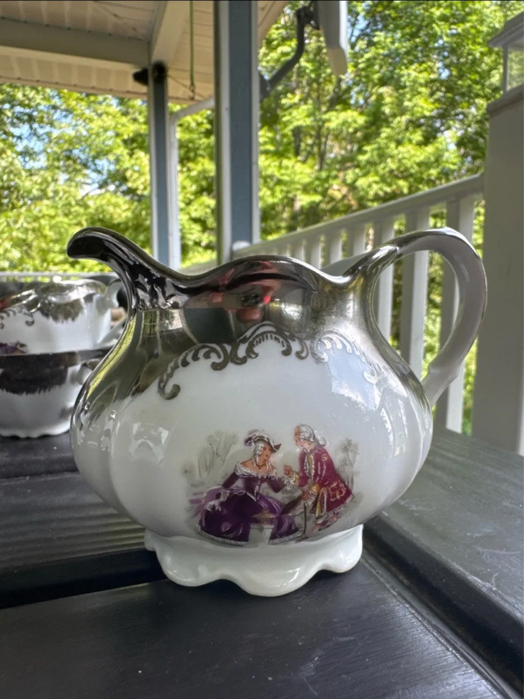 Vintage Tea Set with Teapot, Creamer, and Cups image indicator(3)