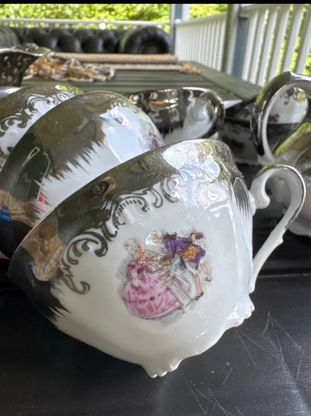 Vintage Tea Set with Teapot, Creamer, and Cups image indicator(4)