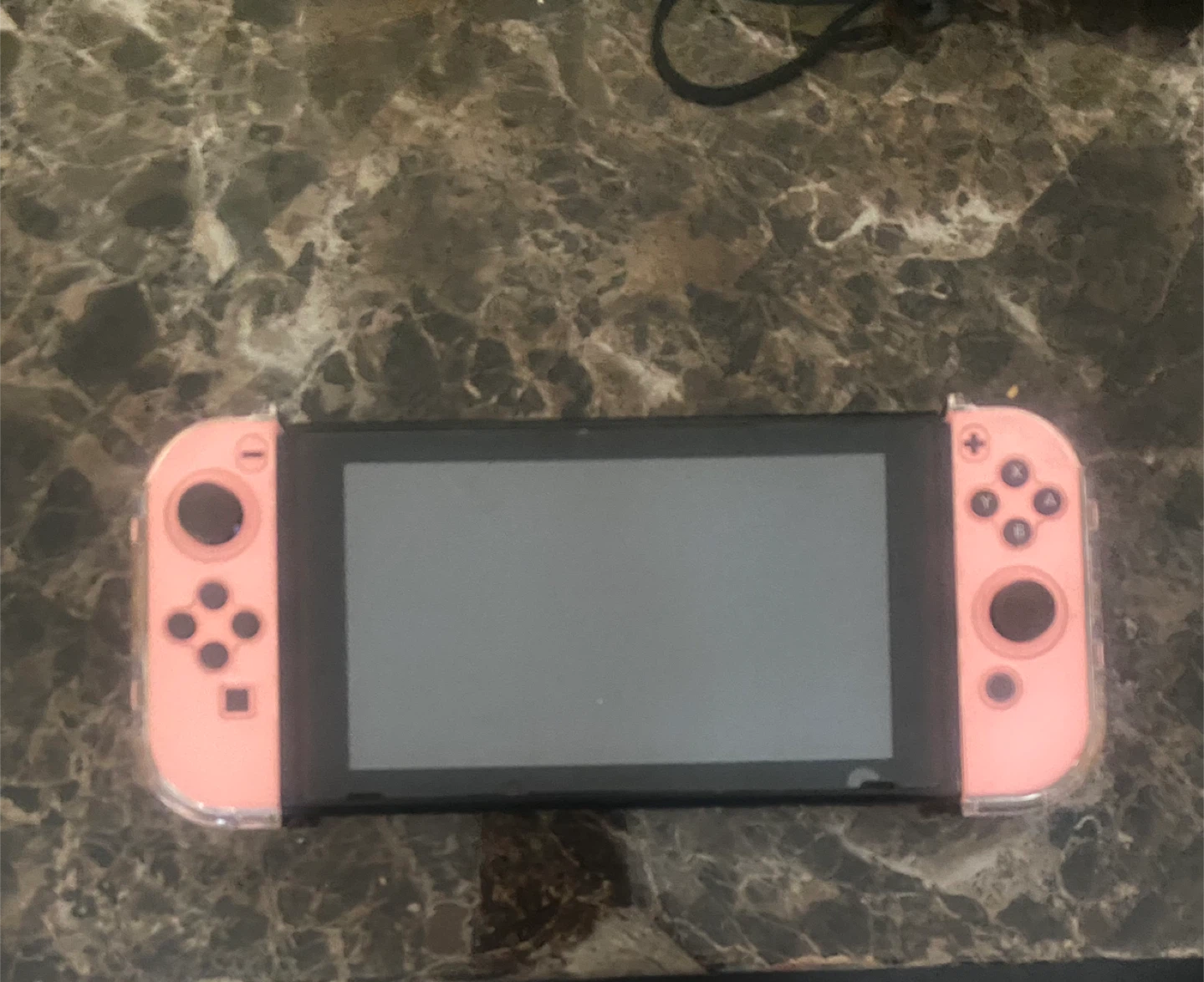 Nintendo Switch with pink protective case - photo 3