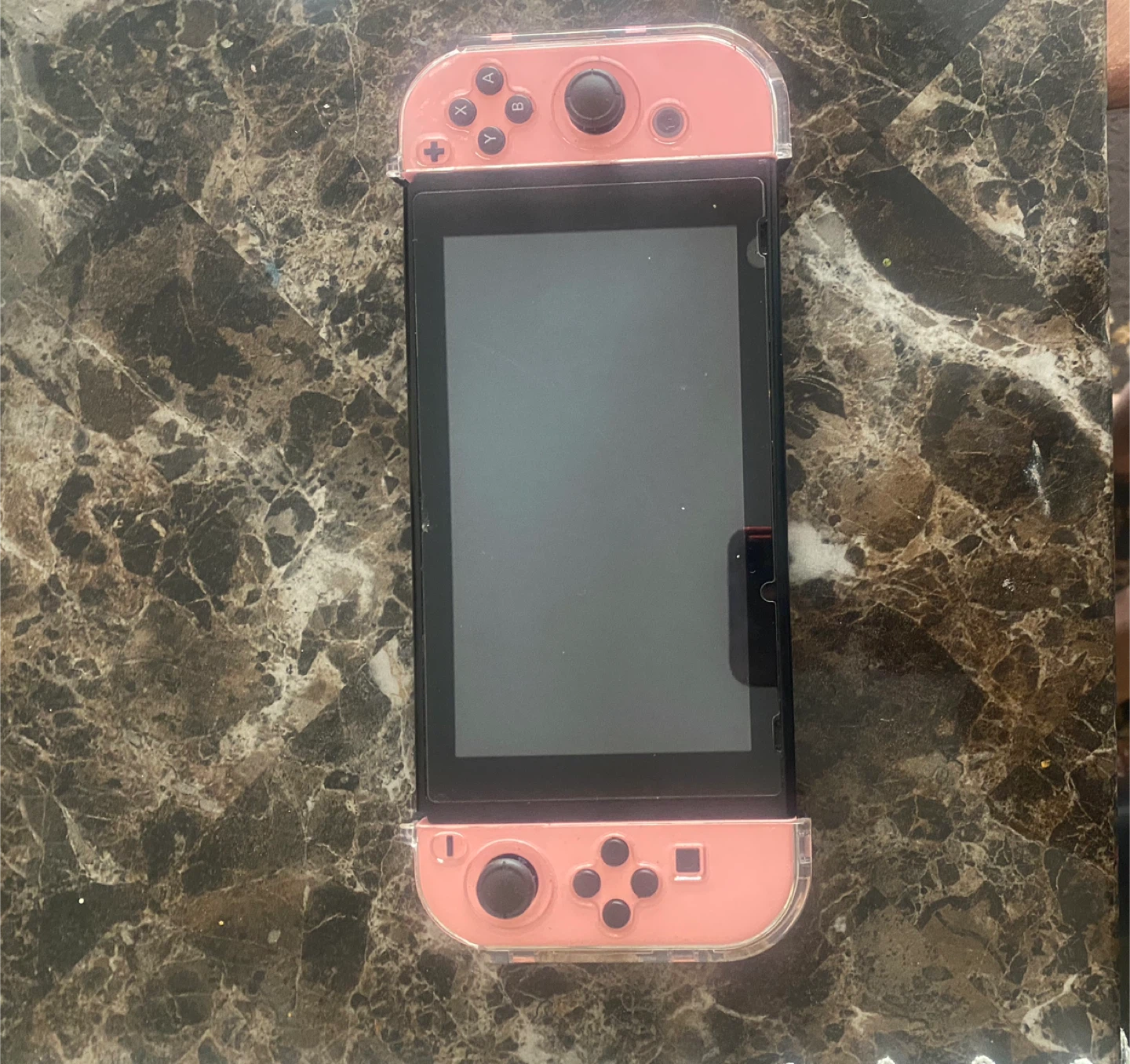 Nintendo Switch with pink protective case - photo 2