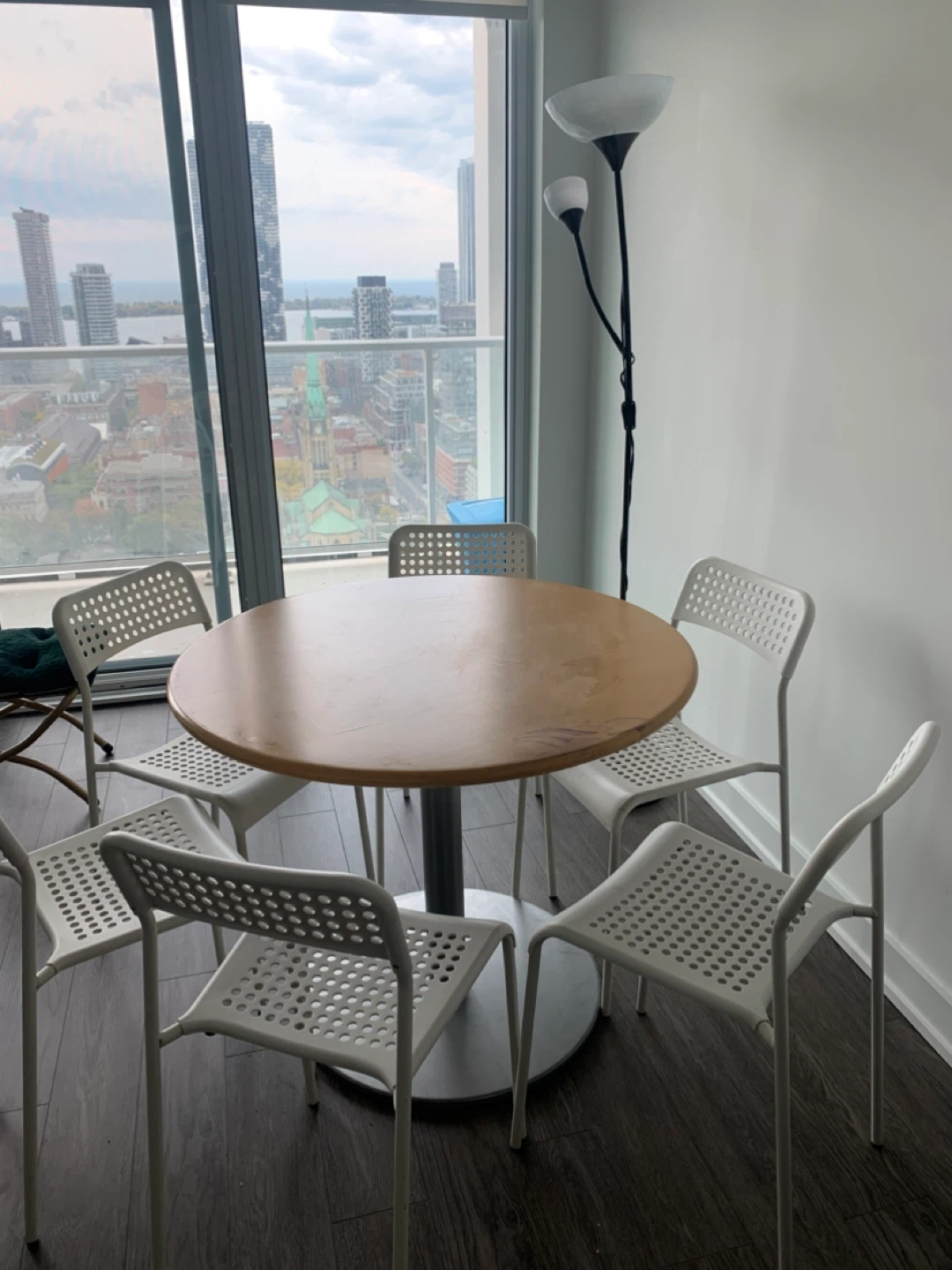 Round Dining Table with 4 White Ikea Chairs