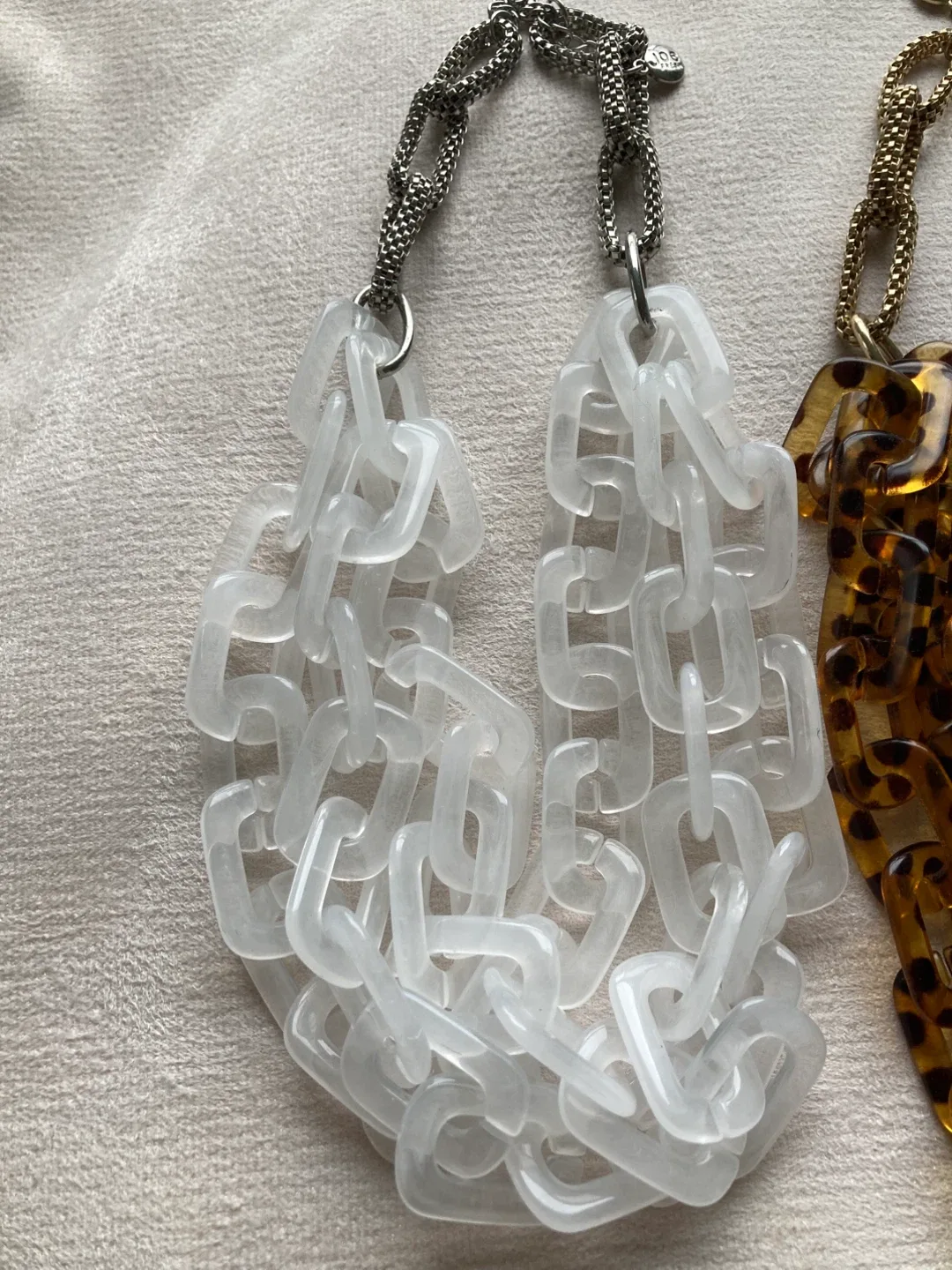 White and animal print statement necklaces image indicator(3)