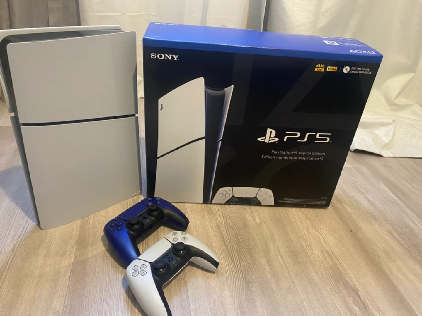 Sony PlayStation 5 Digital Edition Console with 2 Controllers