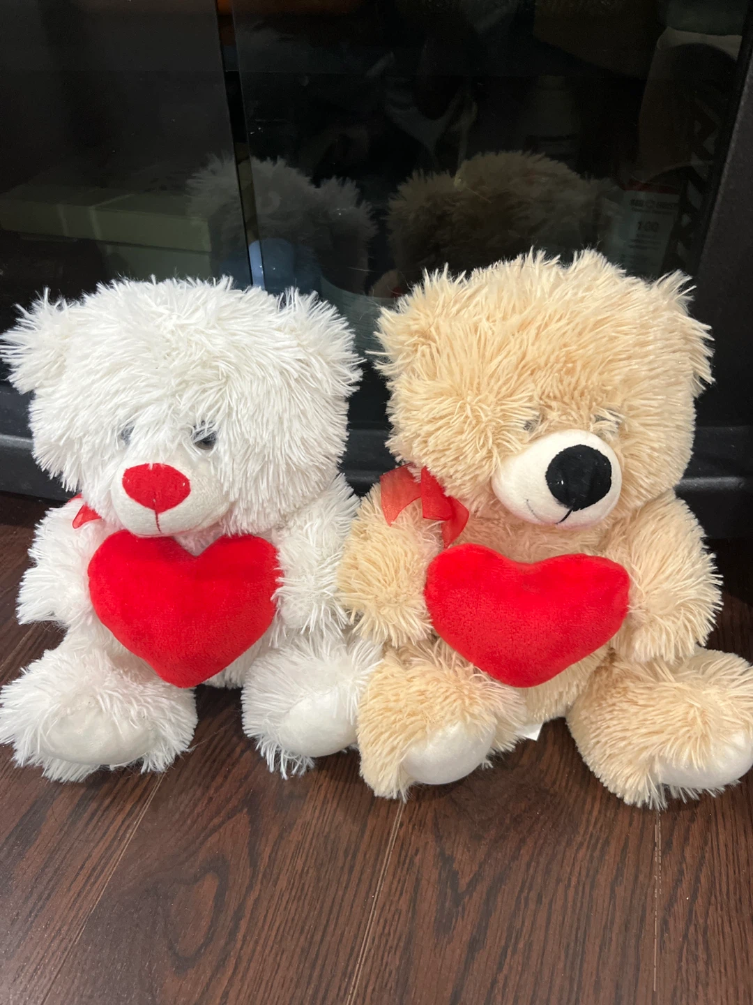 Two Plush Teddy Bears with Hearts
