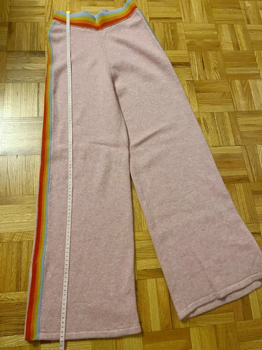 Pink cashmere wide leg pants with rainbow stripes image indicator(6)