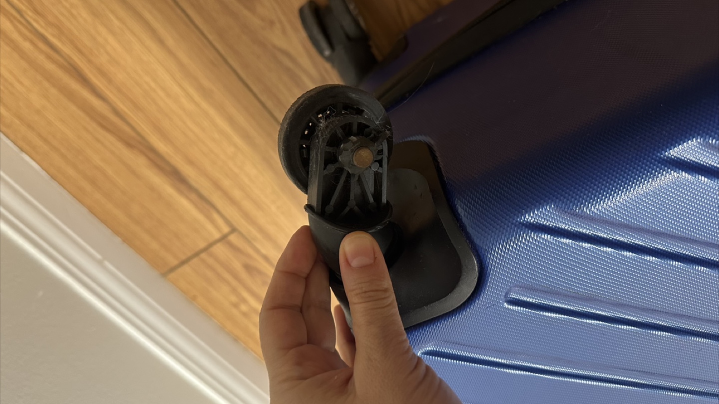 Rolling Suitcase - Damaged Wheel- checkin size - photo 4