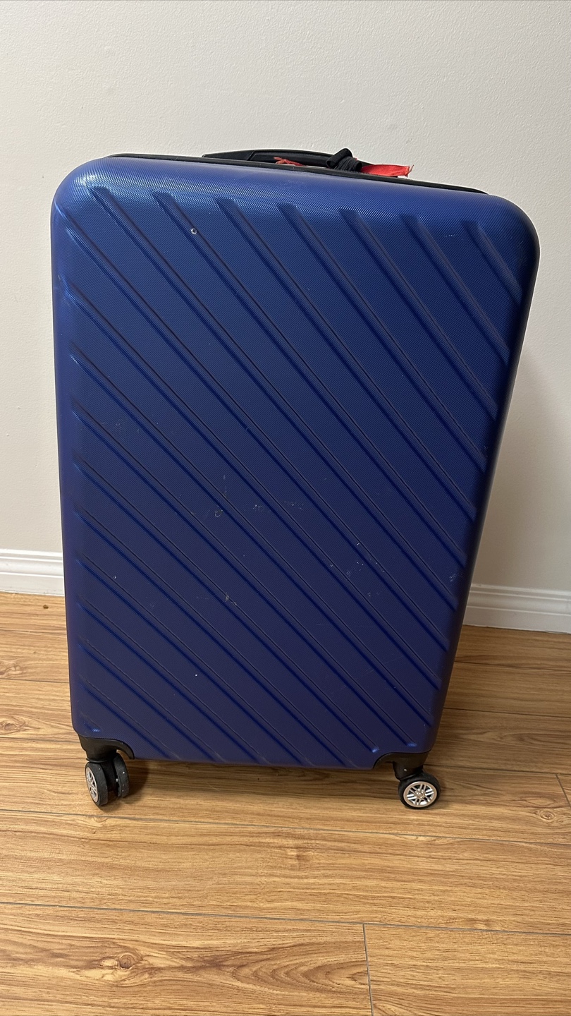 Rolling Suitcase - Damaged Wheel- checkin size