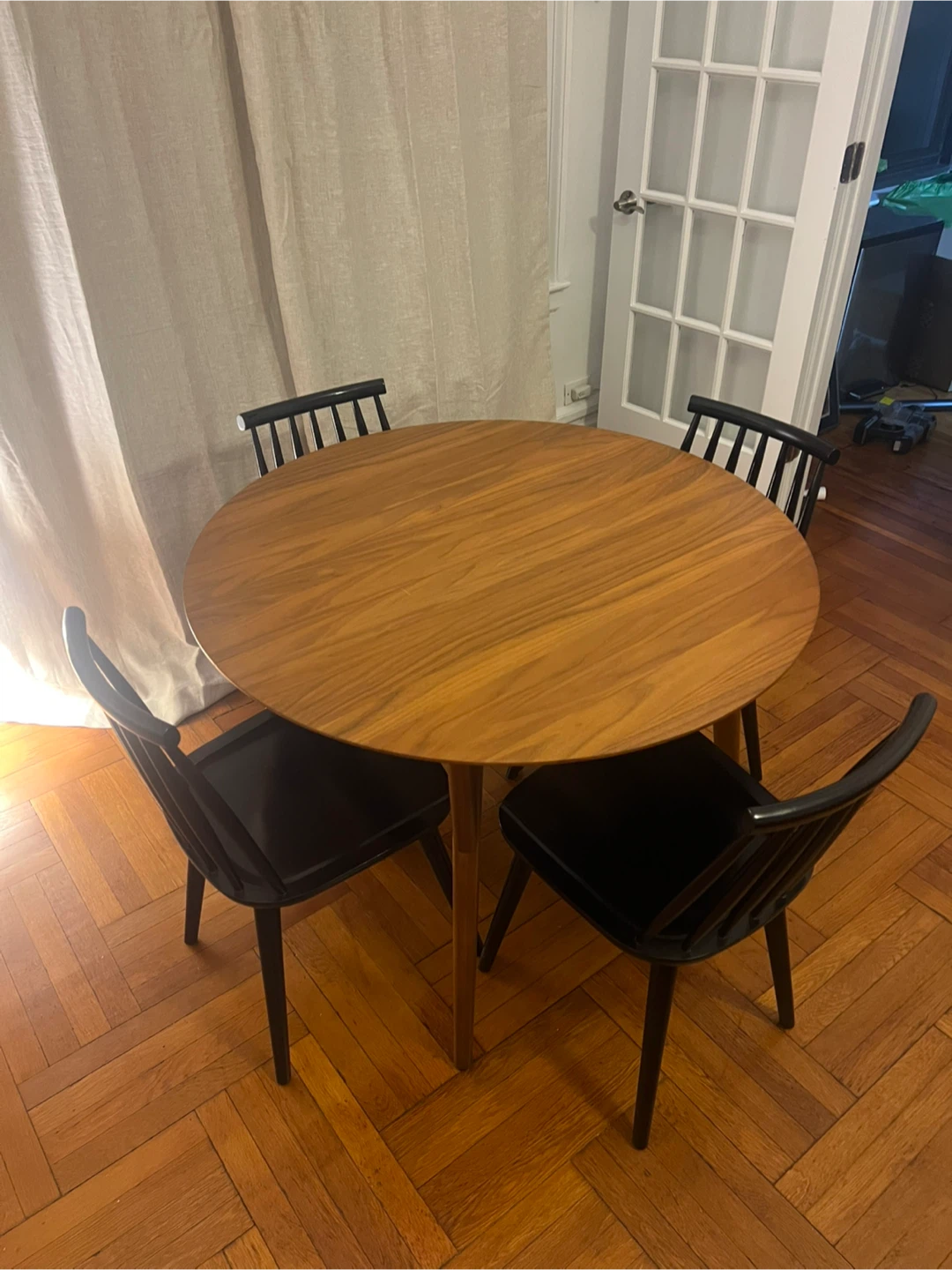Round Wooden Dining Table with 4 Black Chairs