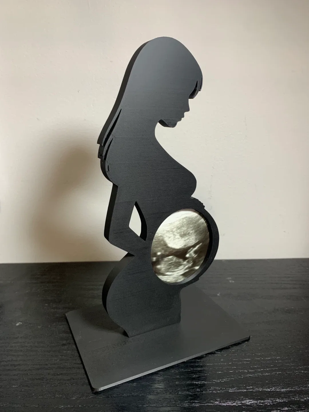 Pregnant Woman Silhouette Ultrasound Display thumbnail