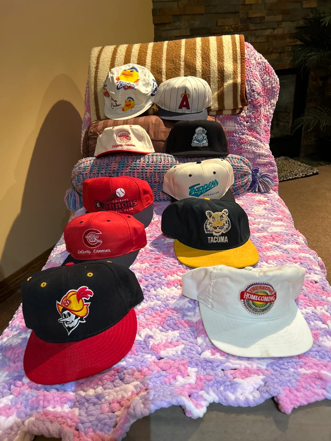 Assorted baseball caps: Calgary Cannons, Trappers, Tacoma