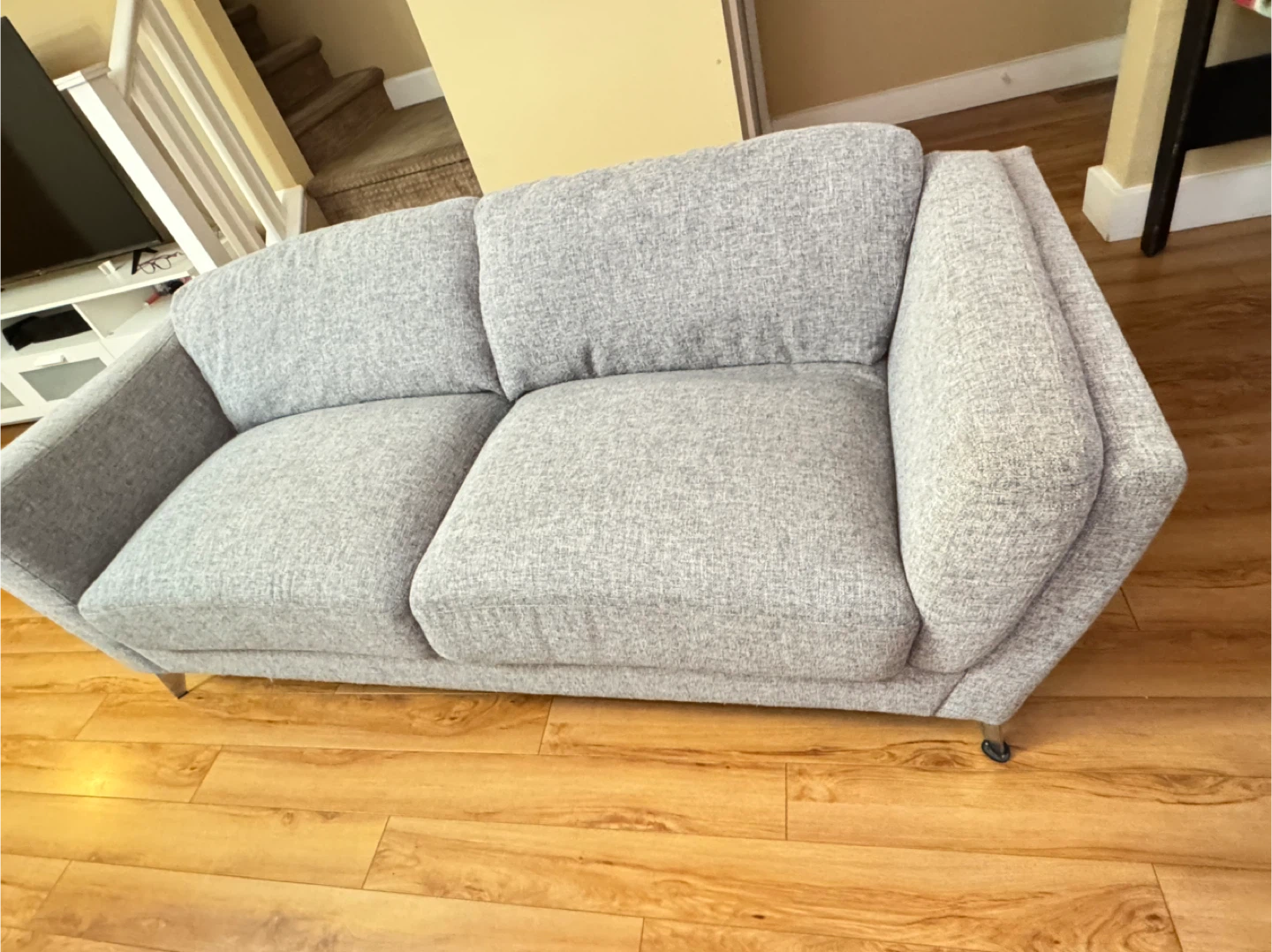 Grey Two-Seat Sofa with Pink Cushions