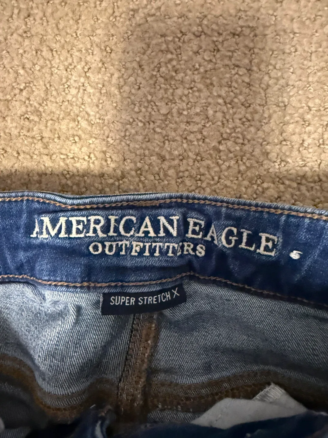 American Eagle Super Stretch X Ripped Jeans image indicator(3)