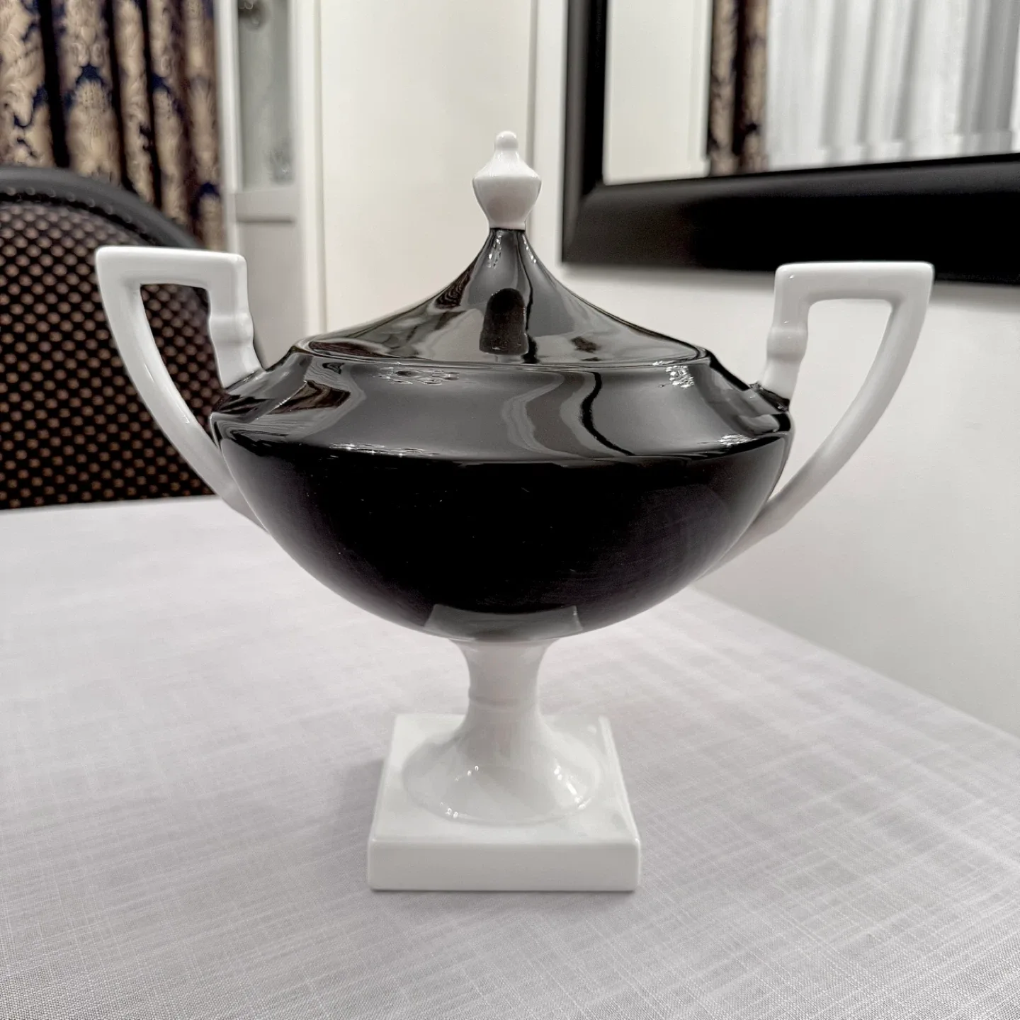 Decorative black & white lidded porcelain urn