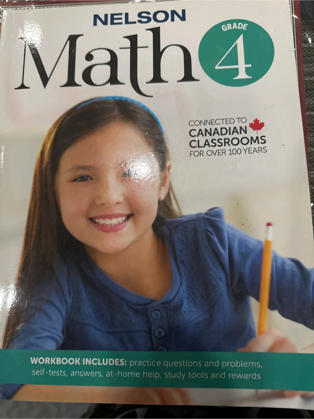 Nelson Math 4 Workbook used