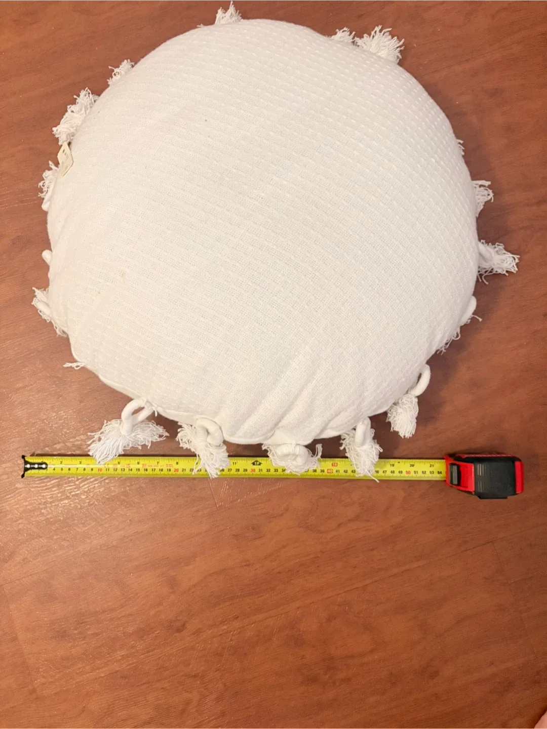 Round White Throw Pillow with Tassels thumbnail