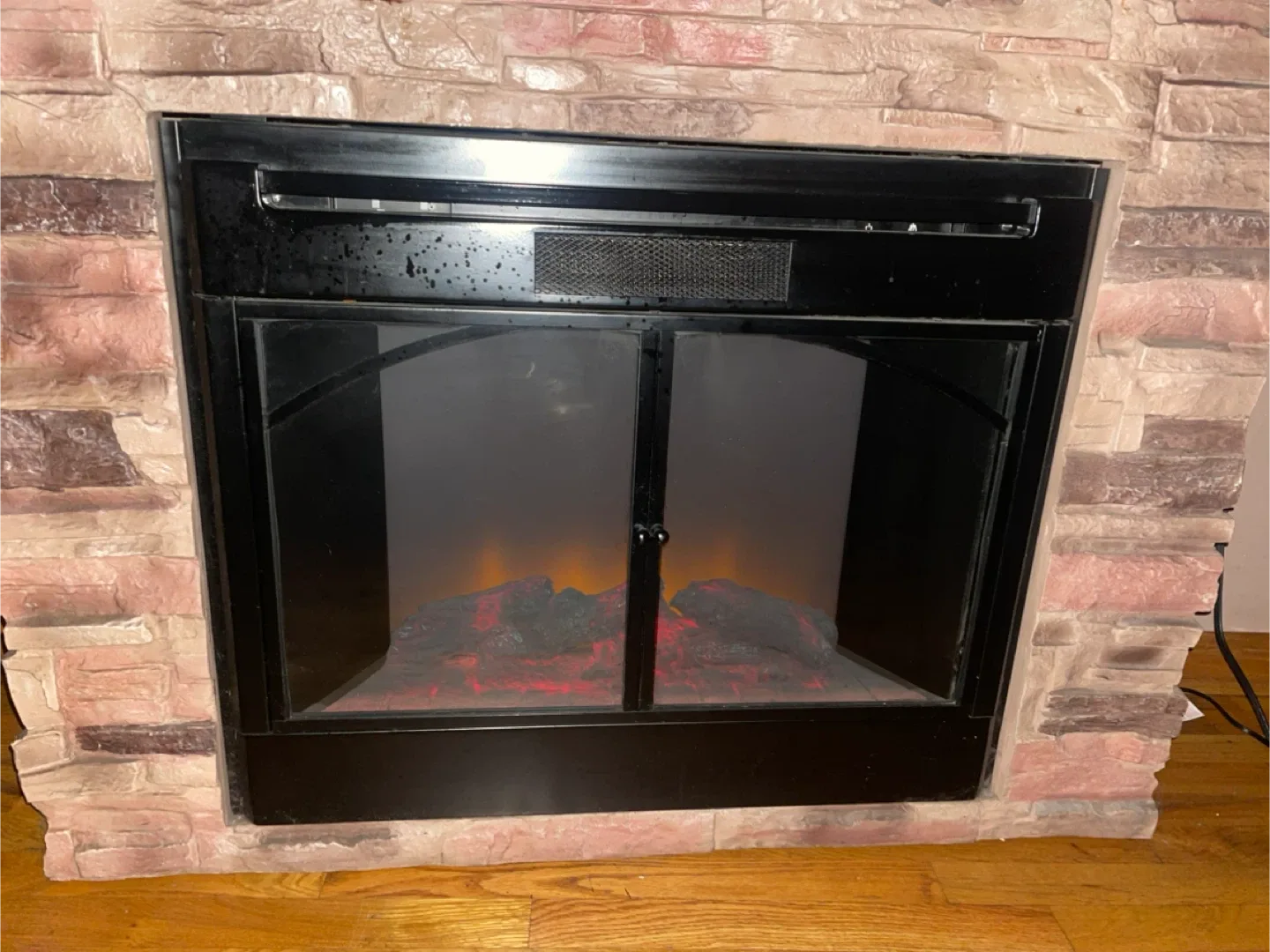 Electric Fireplace with Faux Stone Surround image indicator(4)