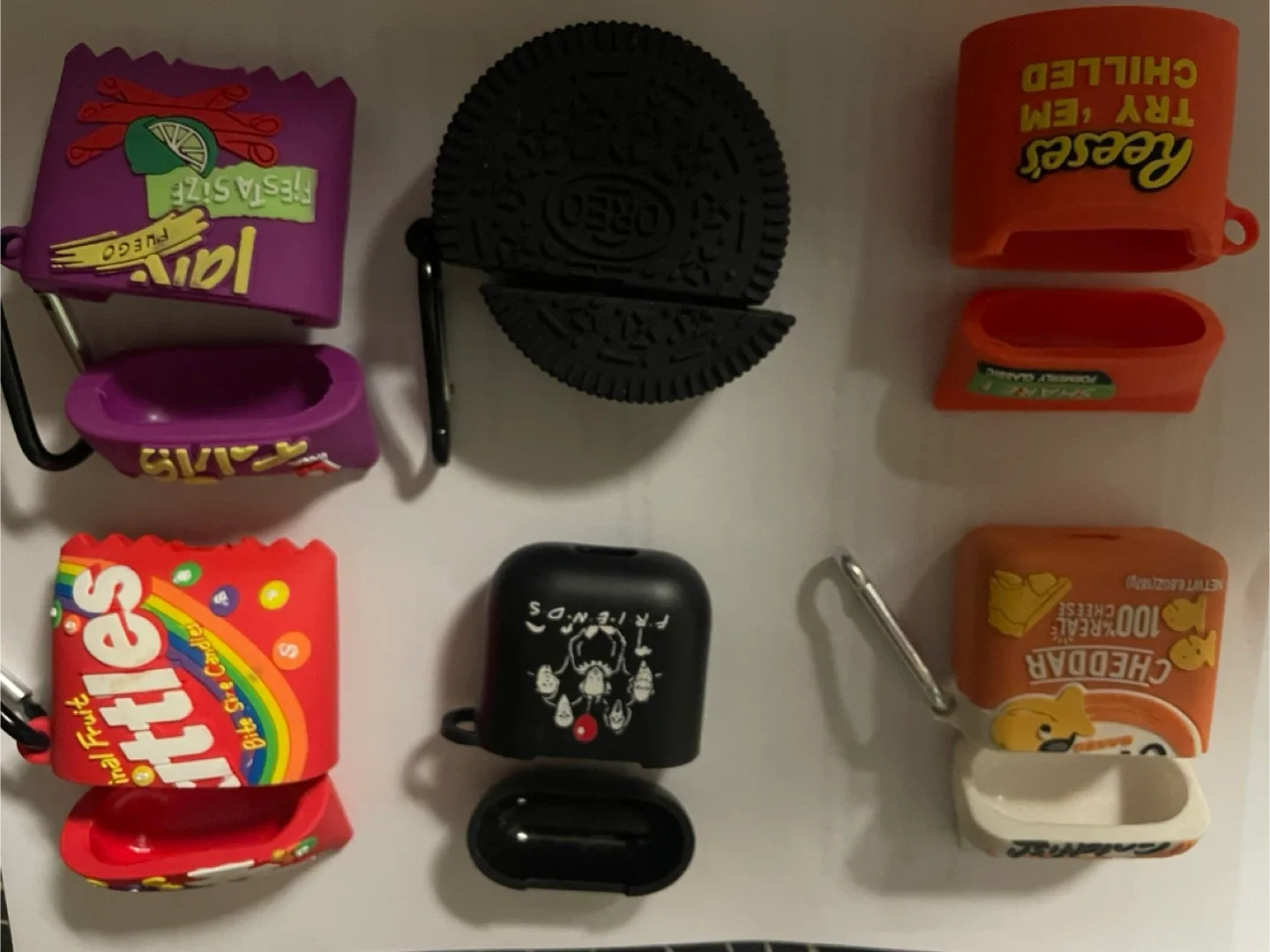 AirPods Cases: Huggy Wuggy, Oreo, Reese's, Friends image indicator(2)