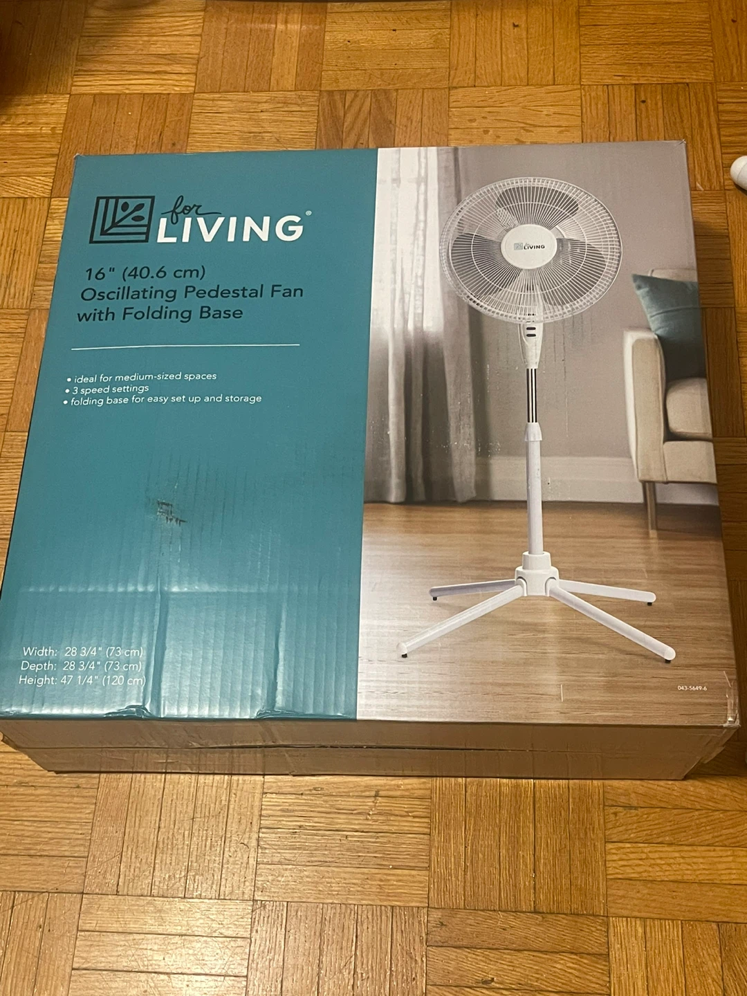 Fan with folding base