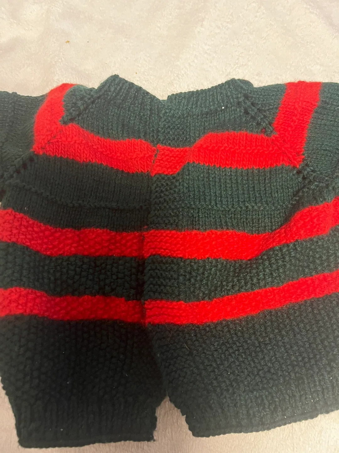 Hand-Knitted Baby Sweaters and Dresses image indicator(2)