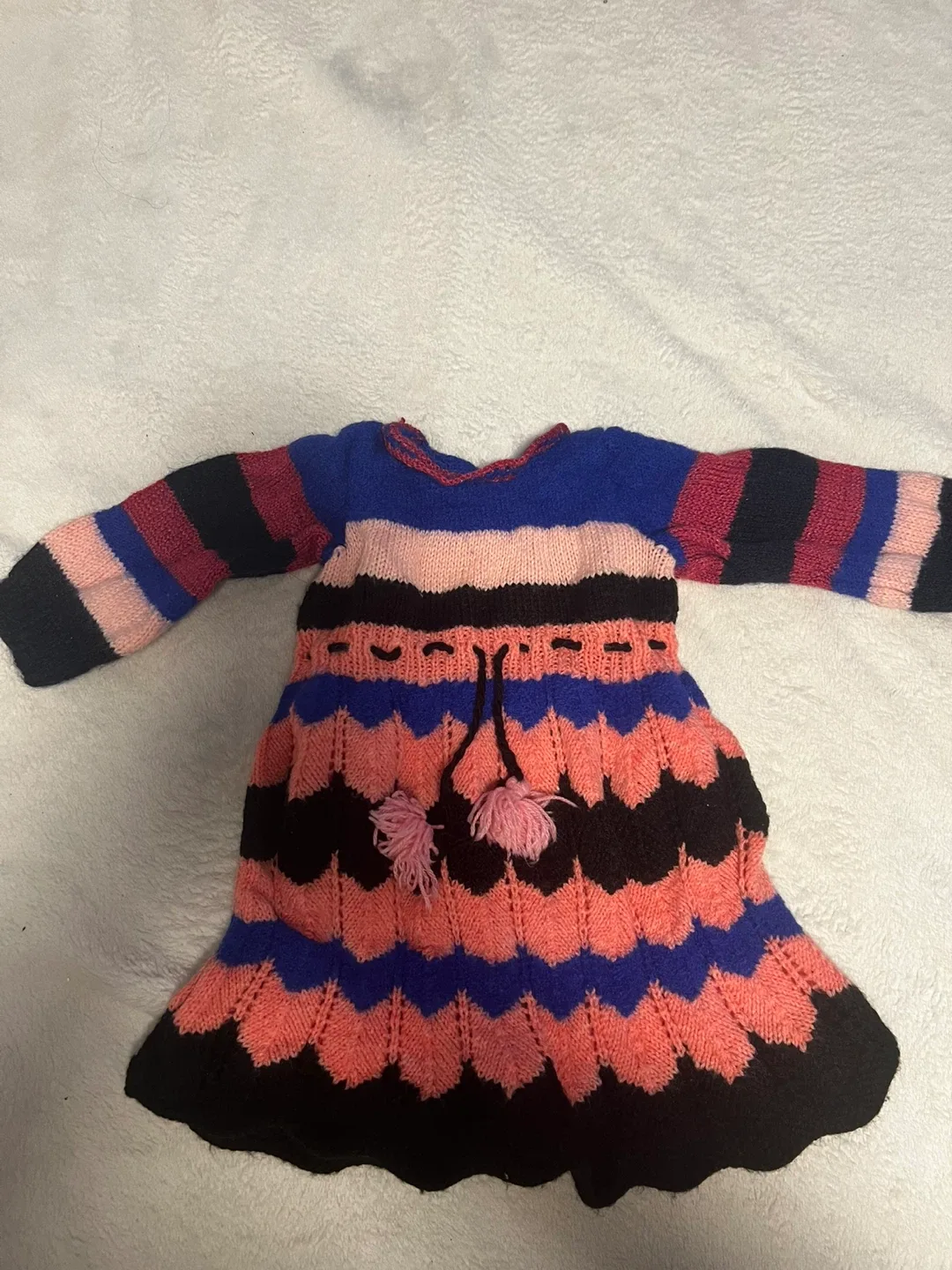 Hand-Knitted Baby Sweaters and Dresses image indicator(3)