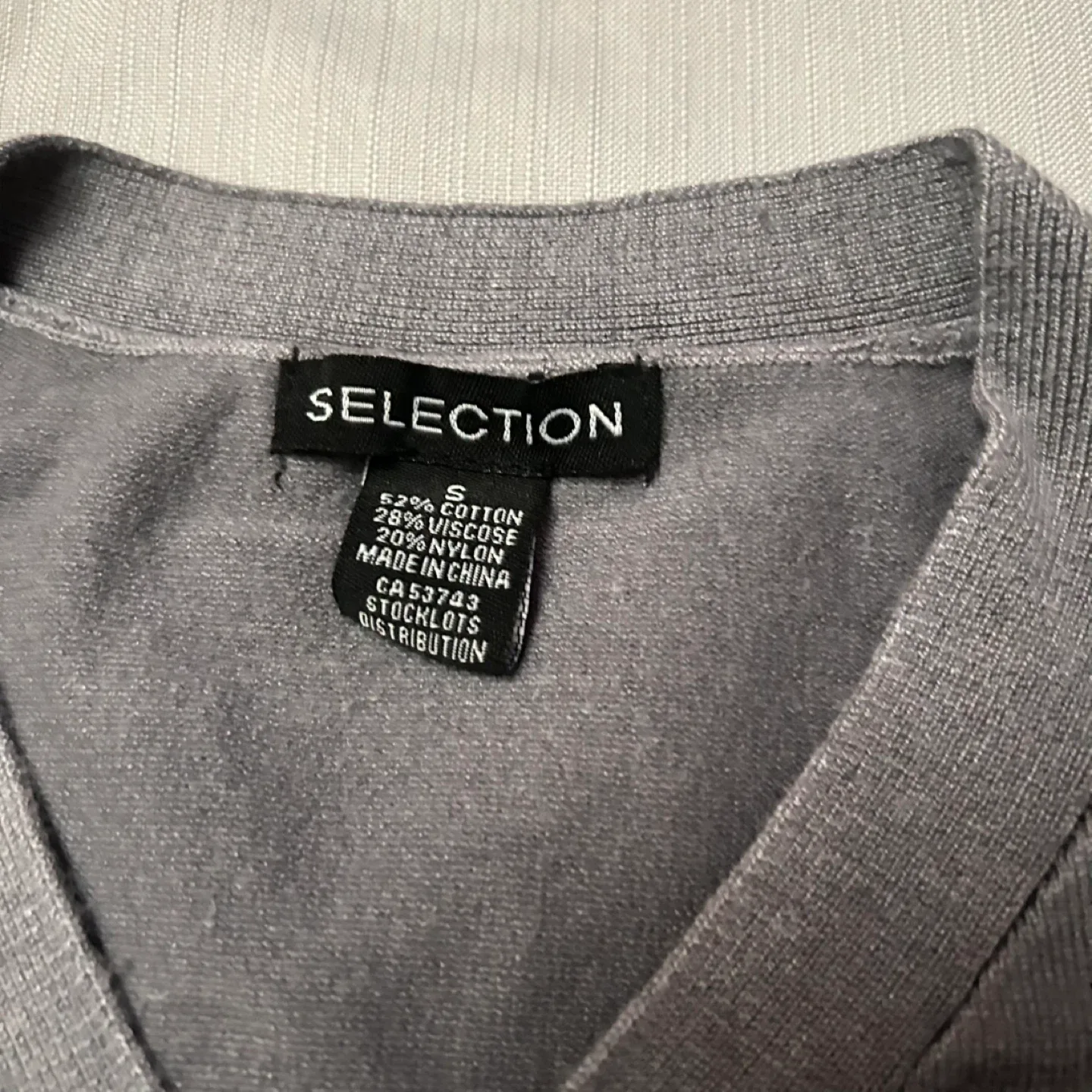 Grey V-neck sweater image indicator(3)