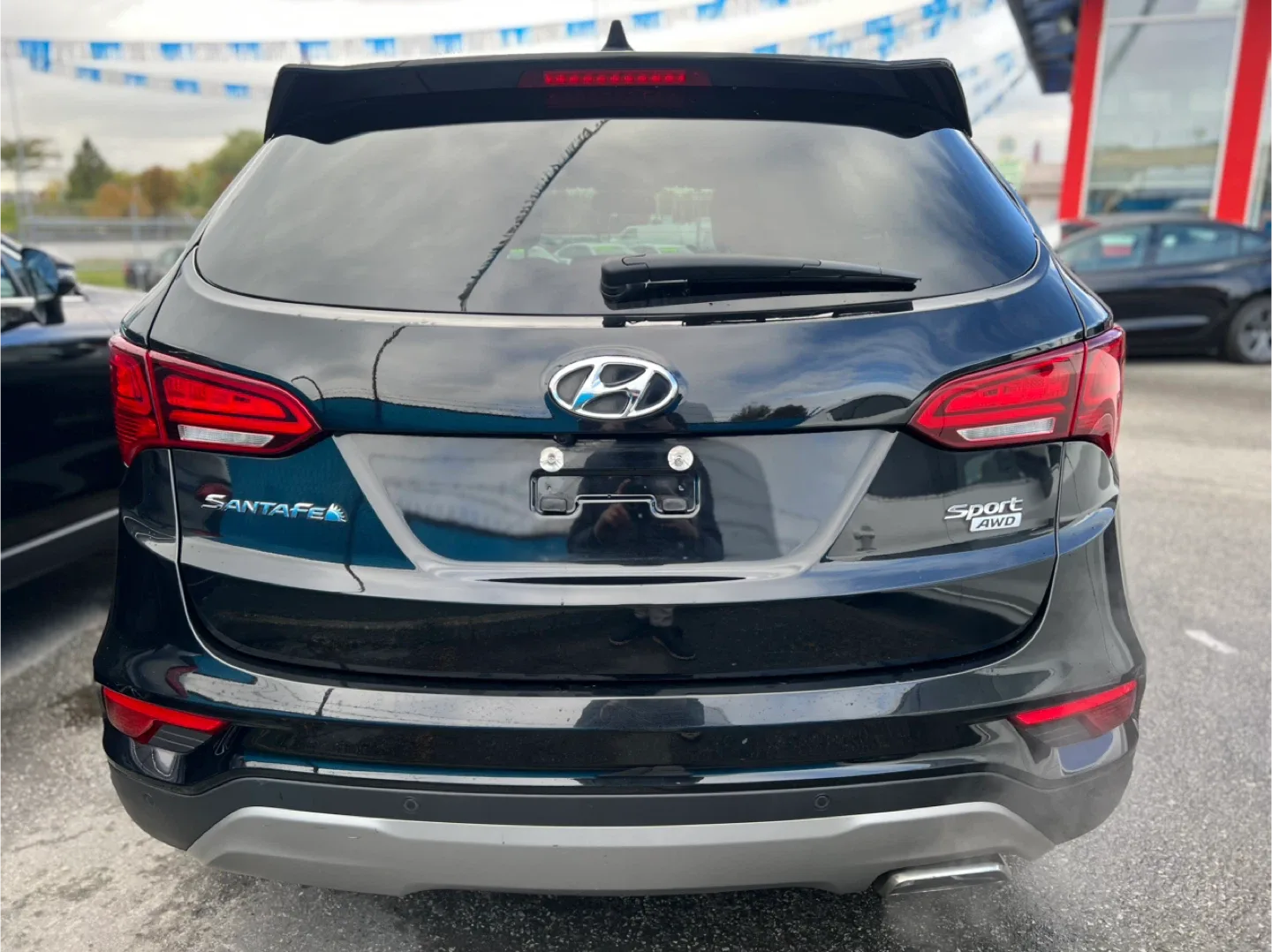 Black Hyundai Santa Fe Sport AWD image indicator(5)