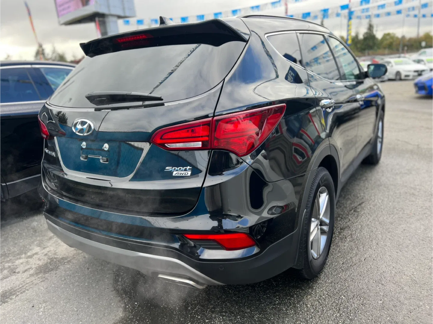 Black Hyundai Santa Fe Sport AWD image indicator(4)