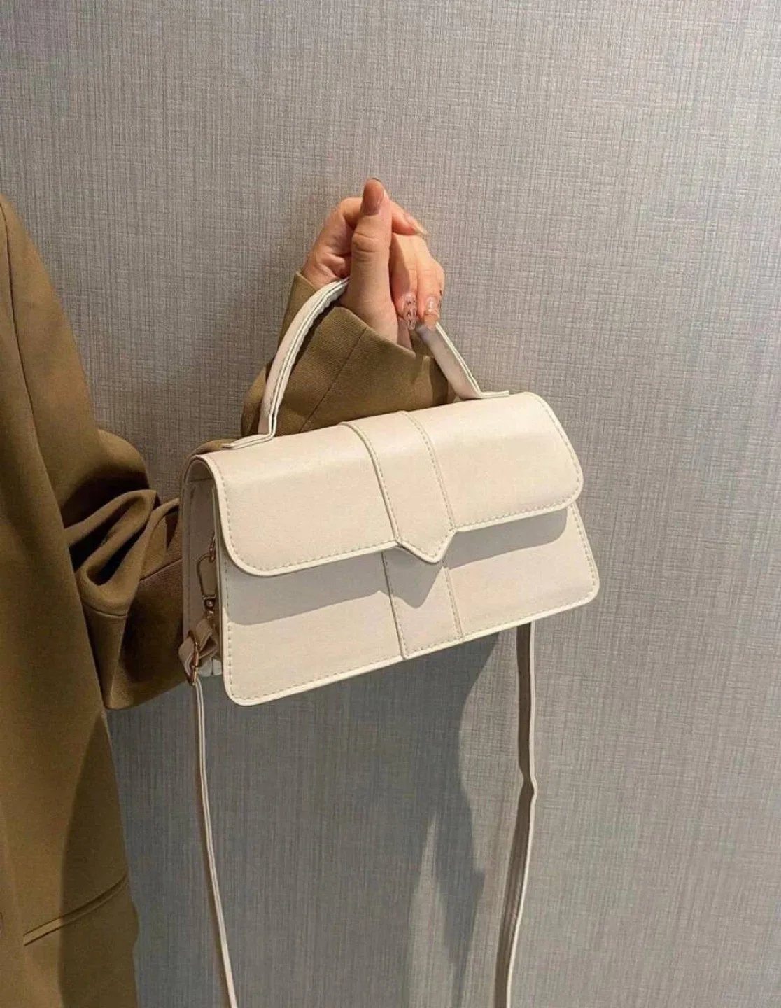 Beige/white minimalist top handle flap square bag image indicator(3)