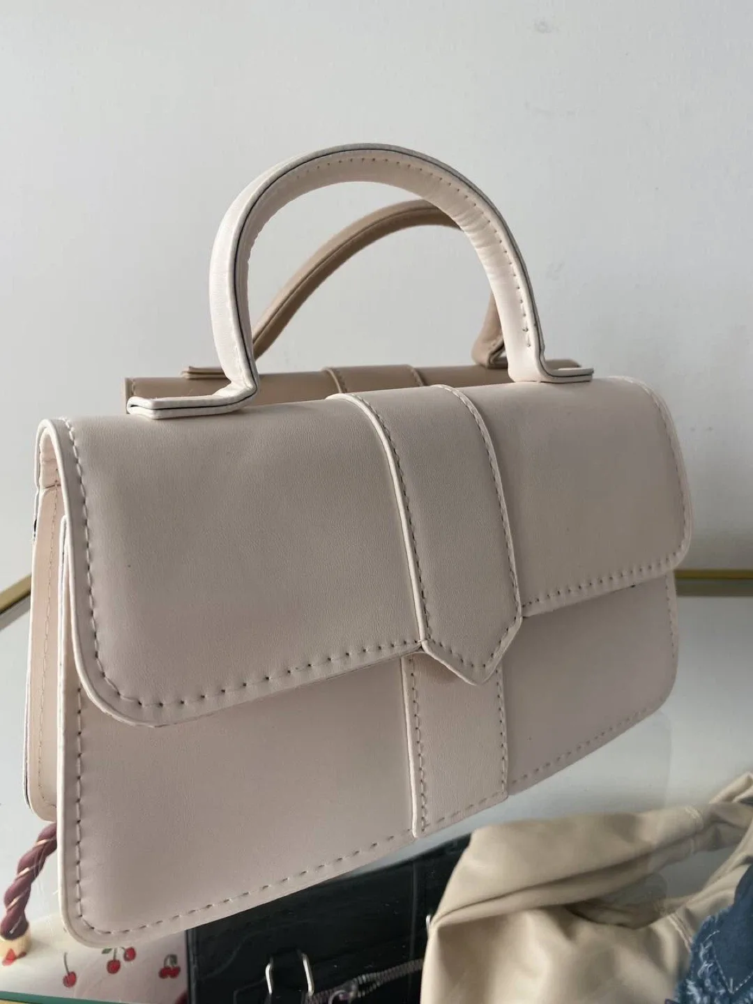 Beige/white minimalist top handle flap square bag image indicator(10)