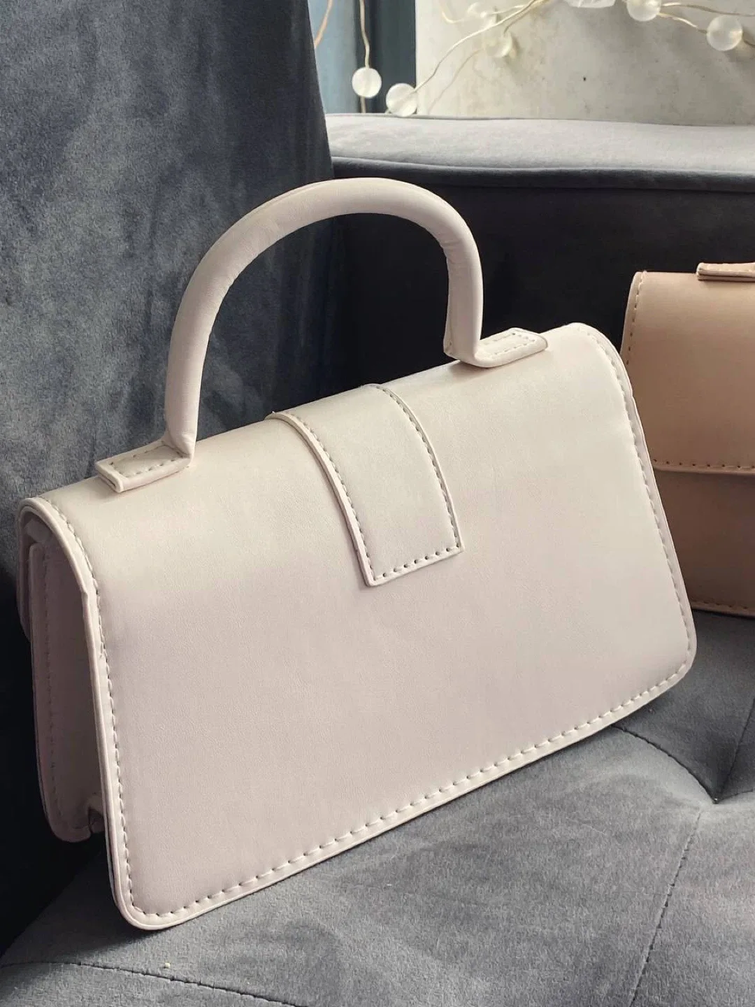 Beige/white minimalist top handle flap square bag image indicator(9)