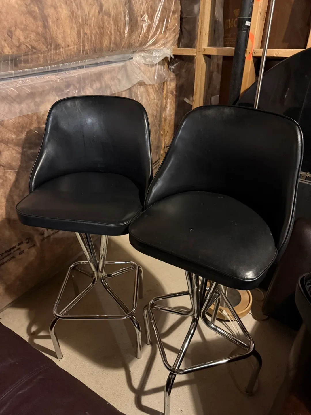 Pair of Black Swivel Bar Stools image indicator(2)