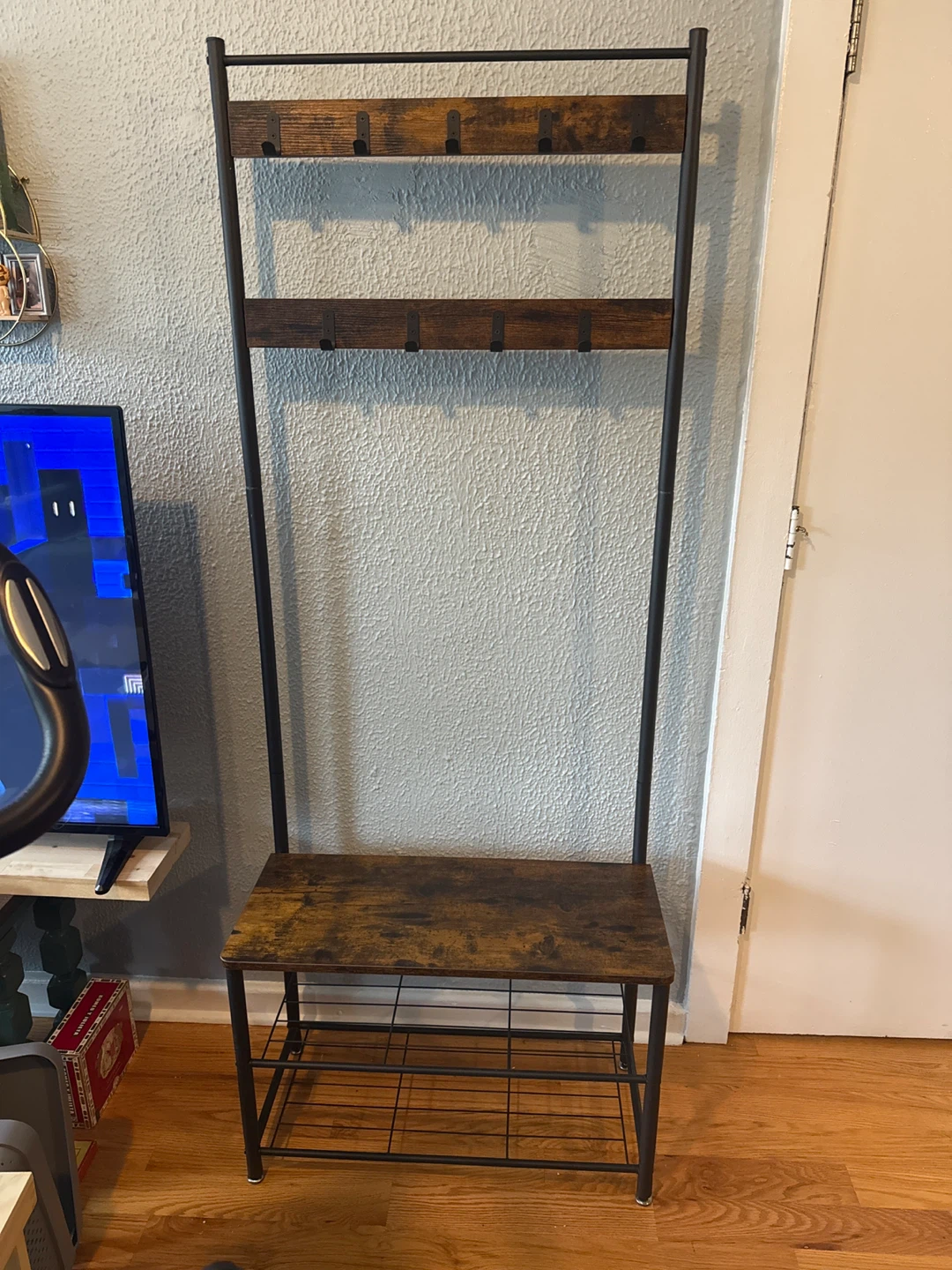 Entry way bench with coatrack and shoe storage