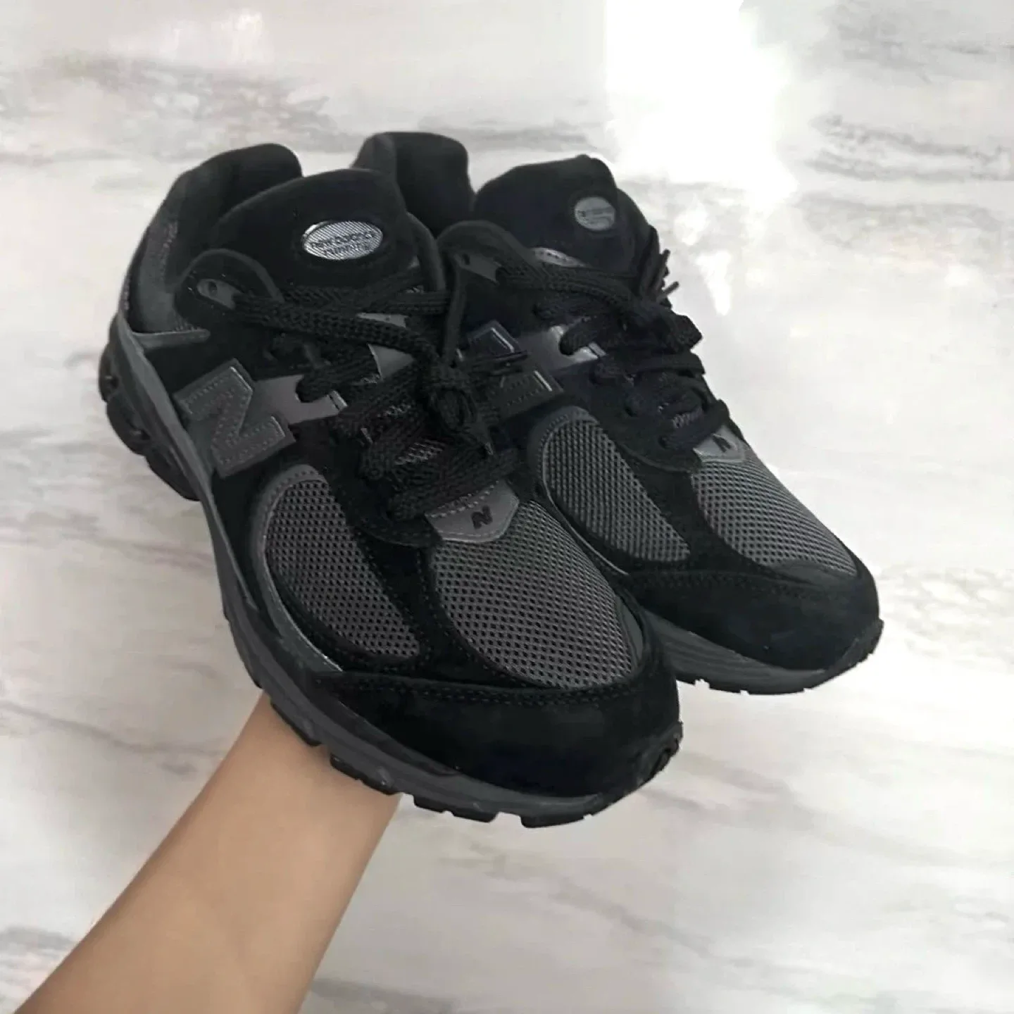 (Retail $210)New Balance 2002R Black Sneakers image indicator(2)