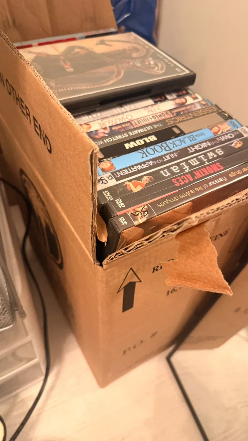 DVD player & Box of DVDs | 85+ Assorted Titles image indicator(3)