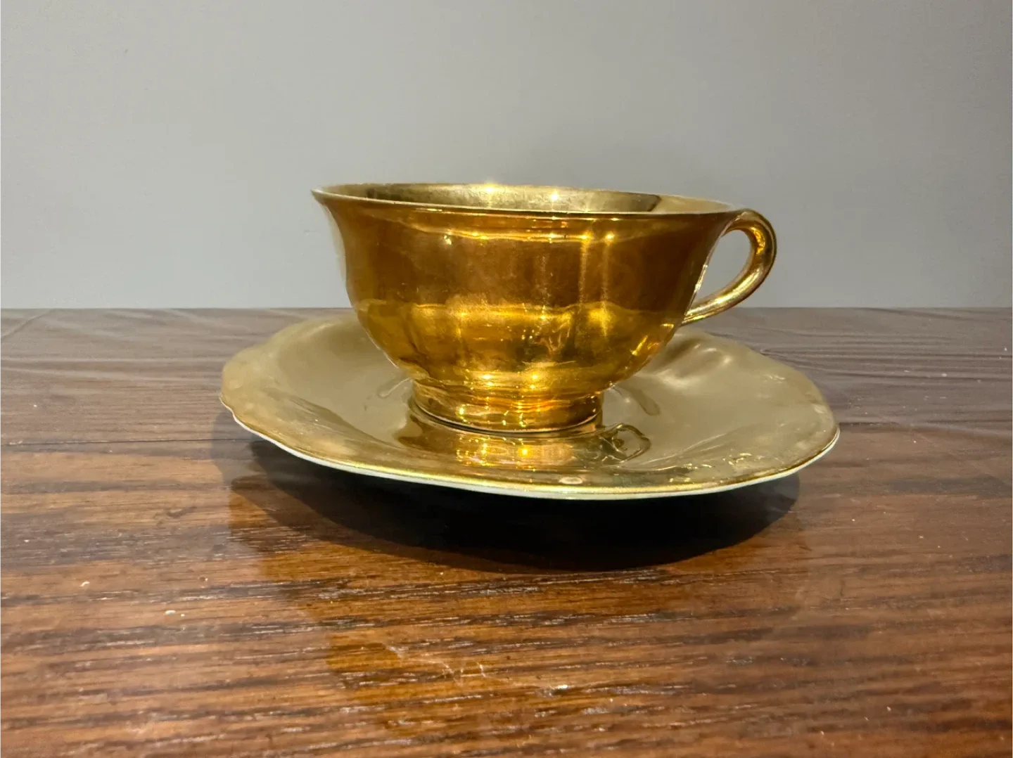 Gold Coloured Teacup and Saucer thumbnail