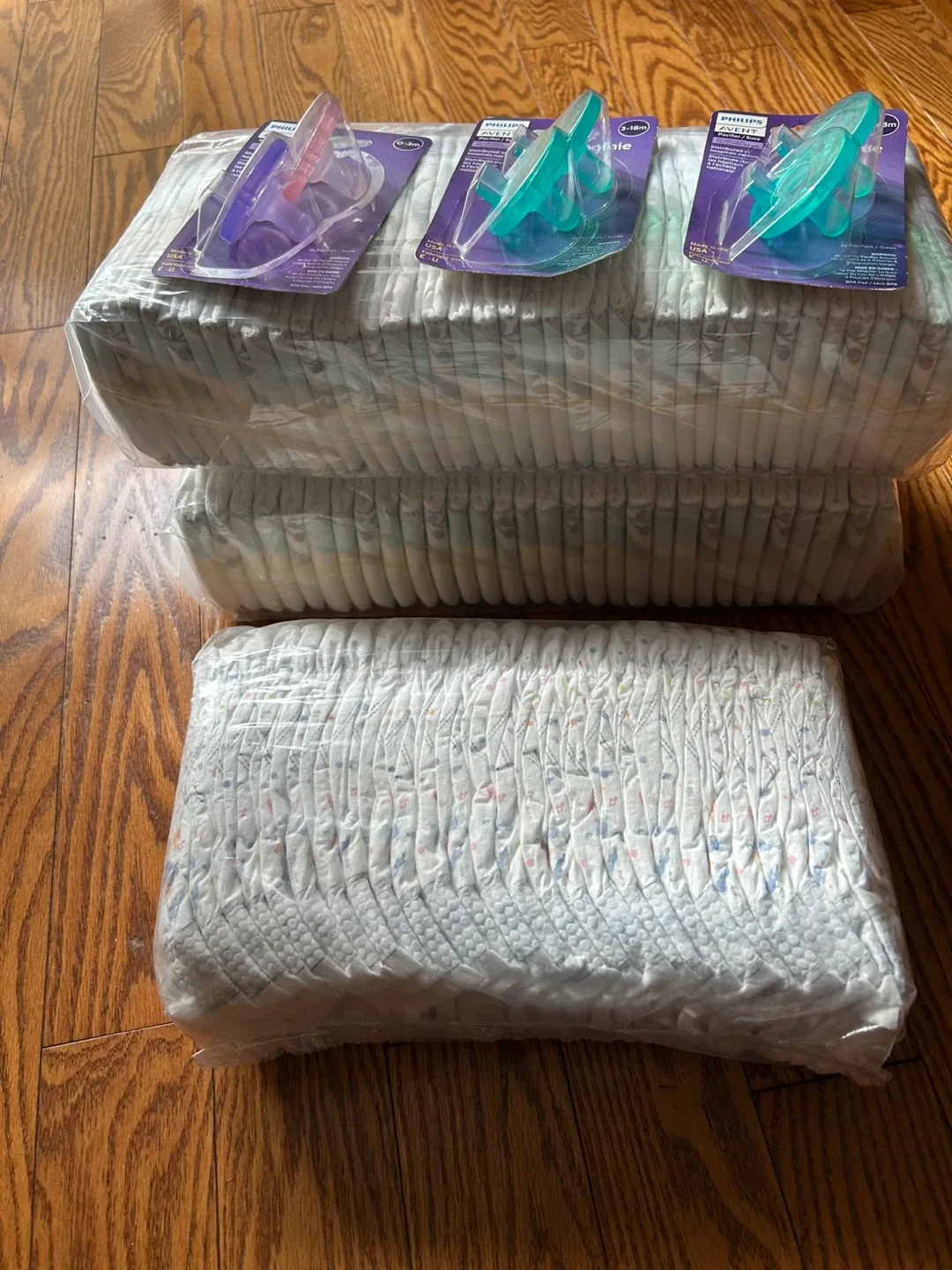 New pacifiers /diapers/free