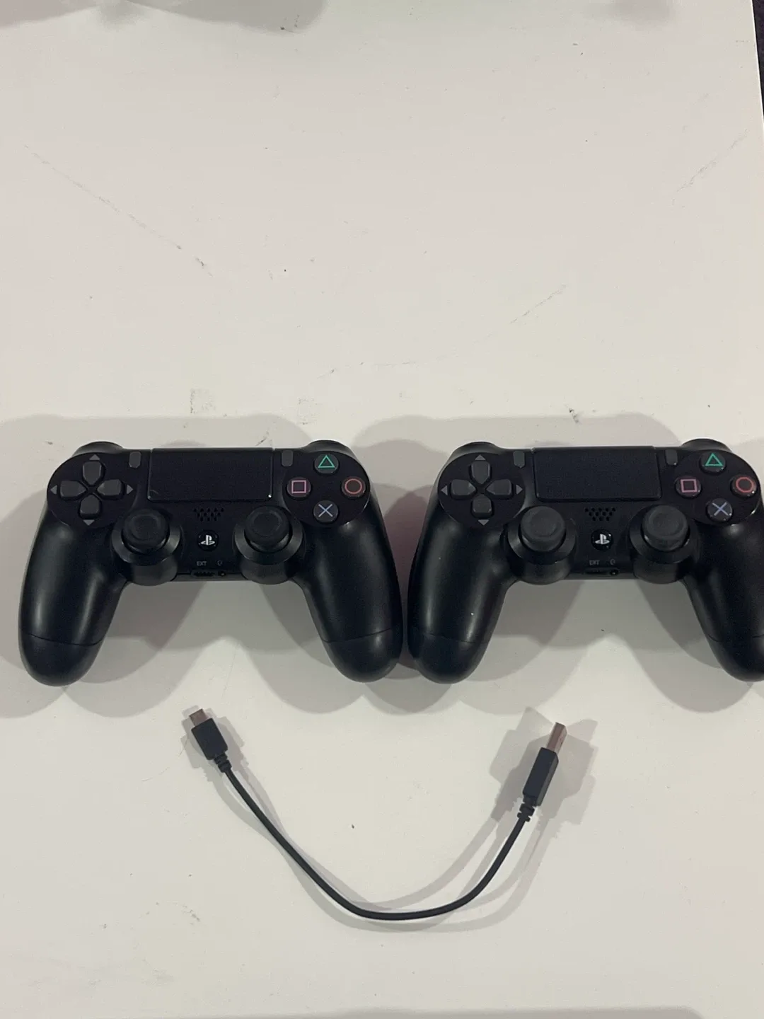 PlayStation 4 Slim with 2 Controllers image indicator(3)