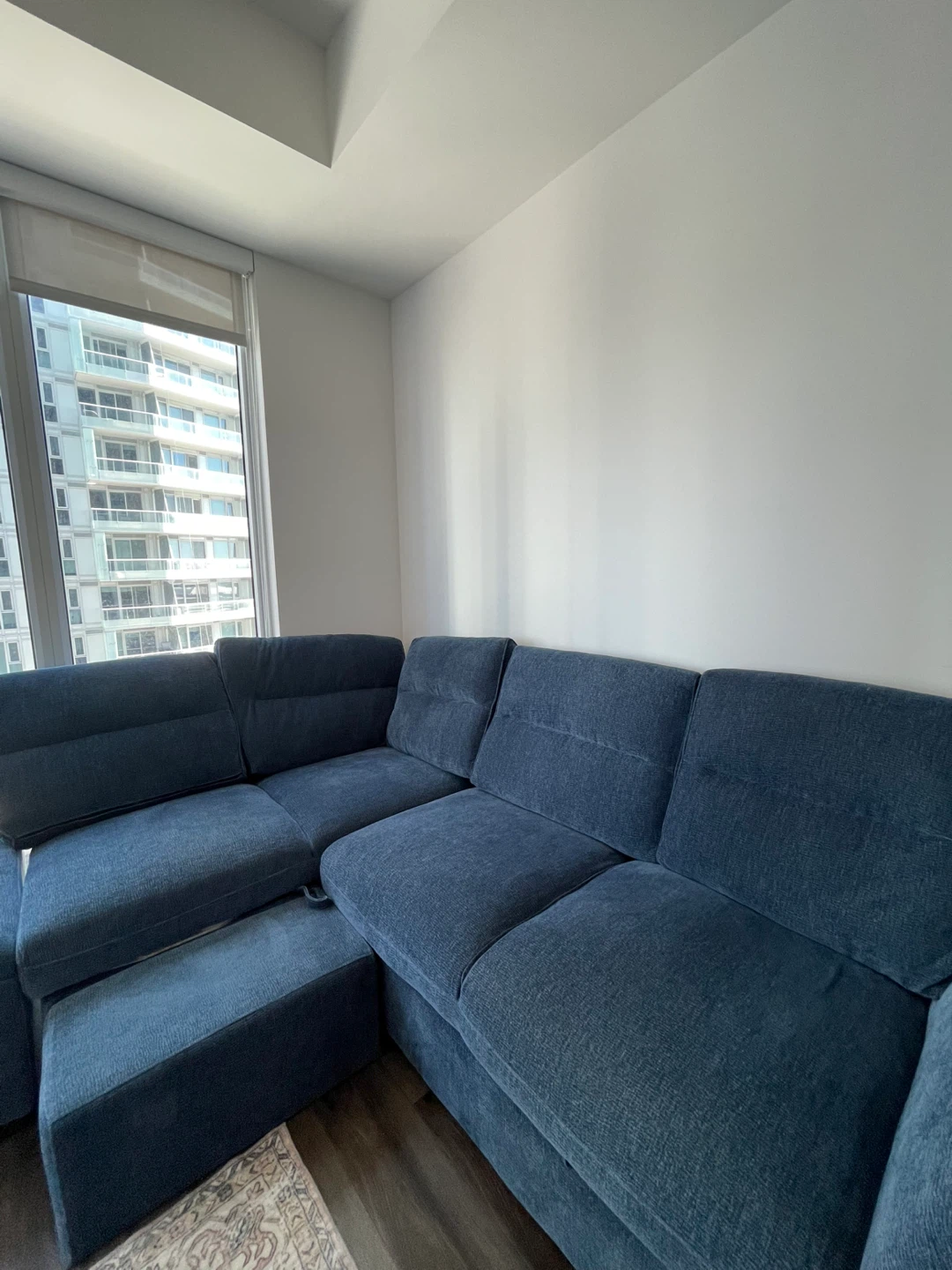 Blue Sectional Sofa-bed with Ottoman