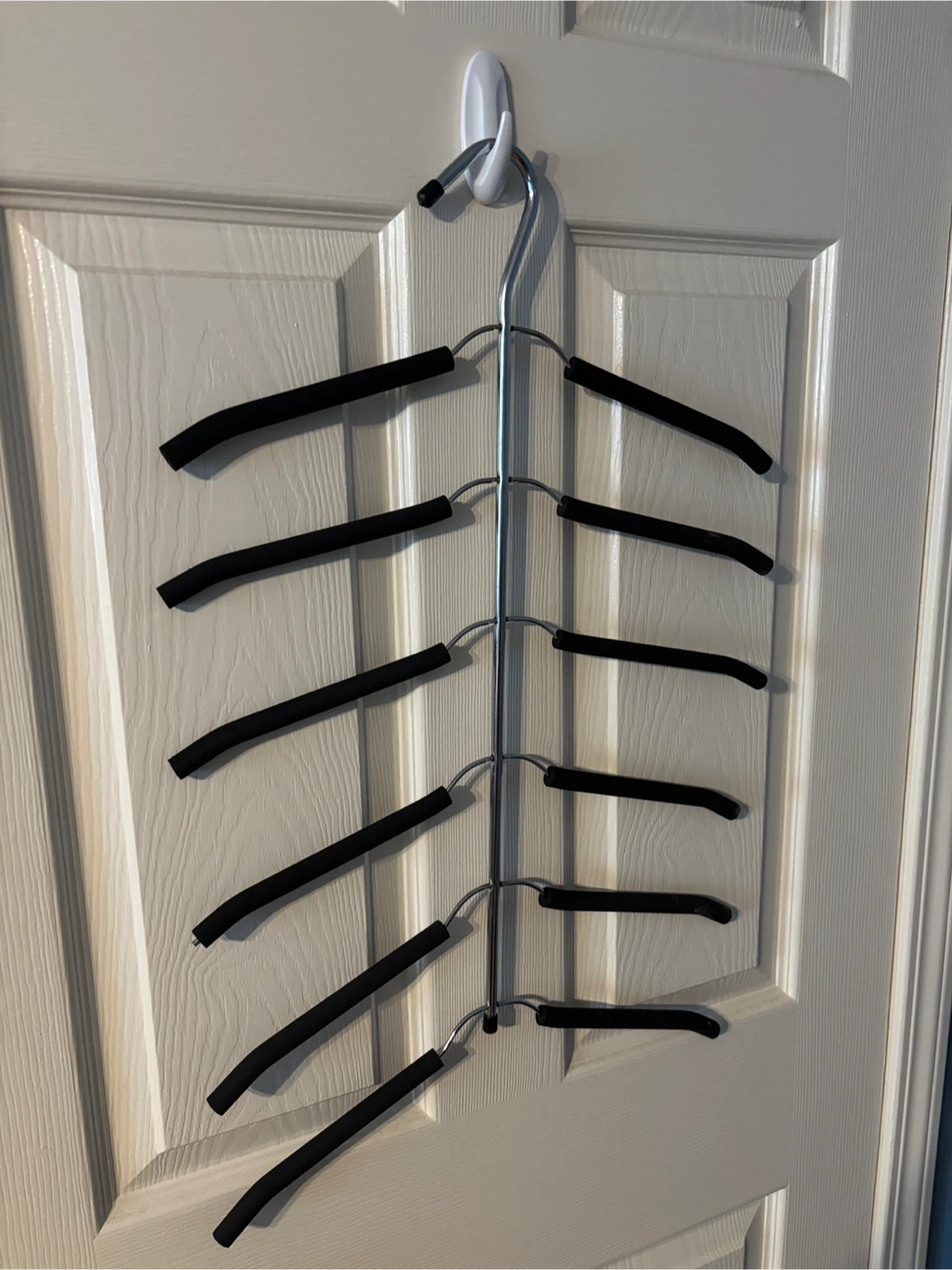 Multi hanger (6 in 1) made of steel, covered with foam