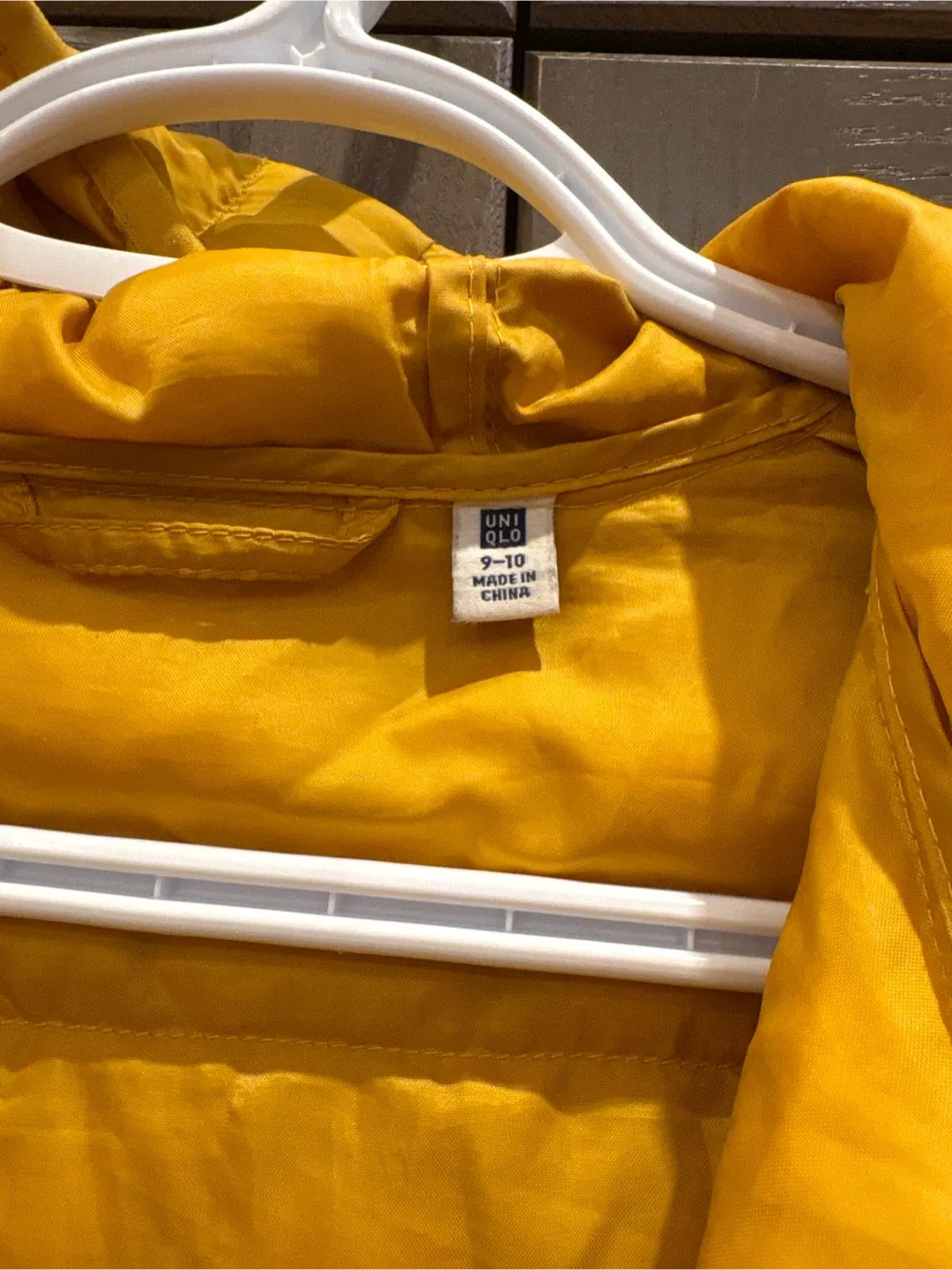 Uniqlo Yellow Puffer Jacket (Size 9-10) image indicator(2)