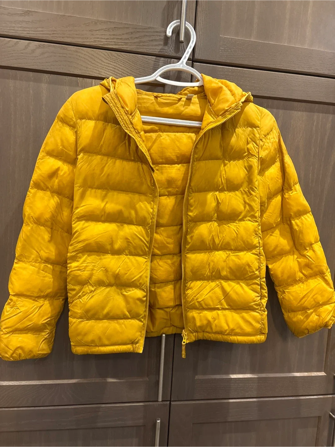 Uniqlo Yellow Puffer Jacket (Size 9-10) thumbnail